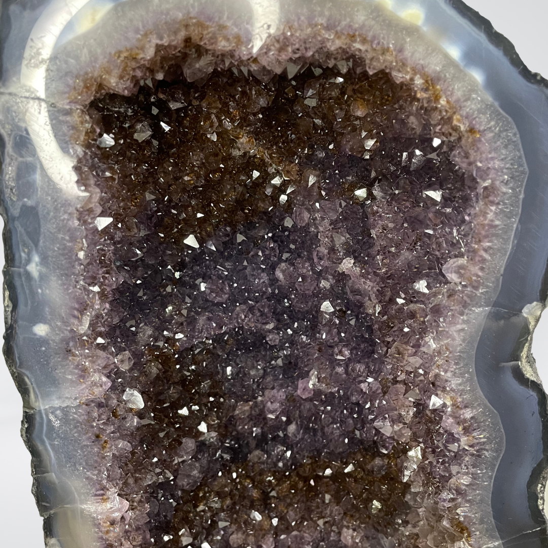 Special Natural Amethyst with Golden Rutile and Silver Particles Display Pair with Wooden Stand - 25.1kg - Huangs Jadeite and Jewelry Pte Ltd