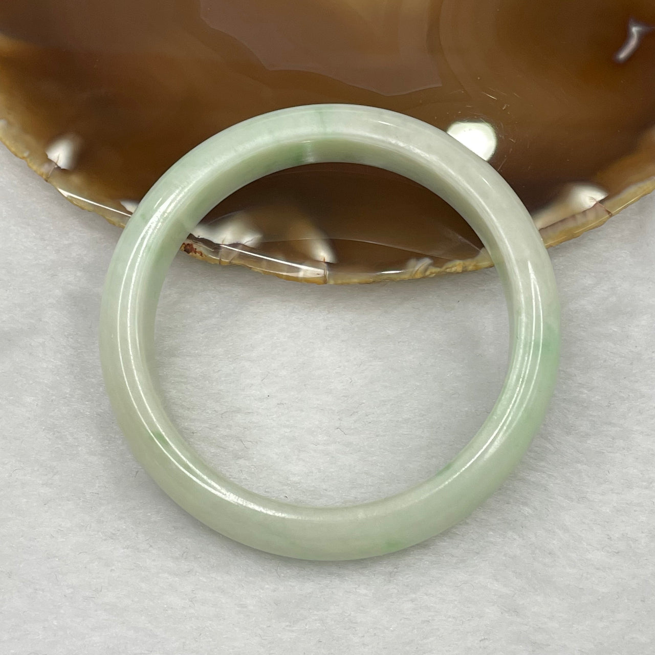 Type A Faint Green Jadeite Bangle 63.51g inner diameter 58.6mm 14.2 by 7.8mm - Huangs Jadeite and Jewelry Pte Ltd