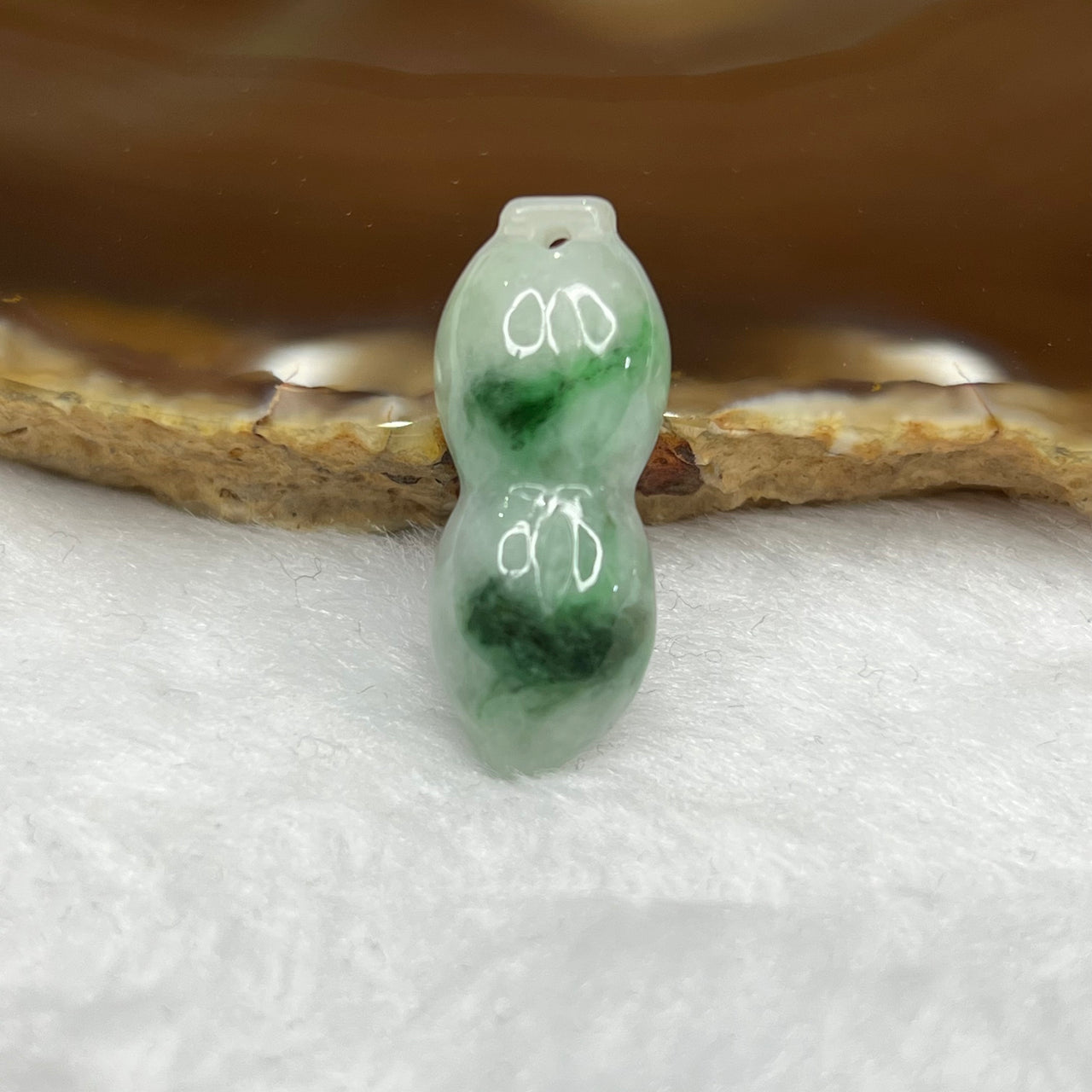 Type A Green Piao Hua Jade Jadeite Peanut - 6.18g 28.2 by 11.2 by 11.2 mm - Huangs Jadeite and Jewelry Pte Ltd