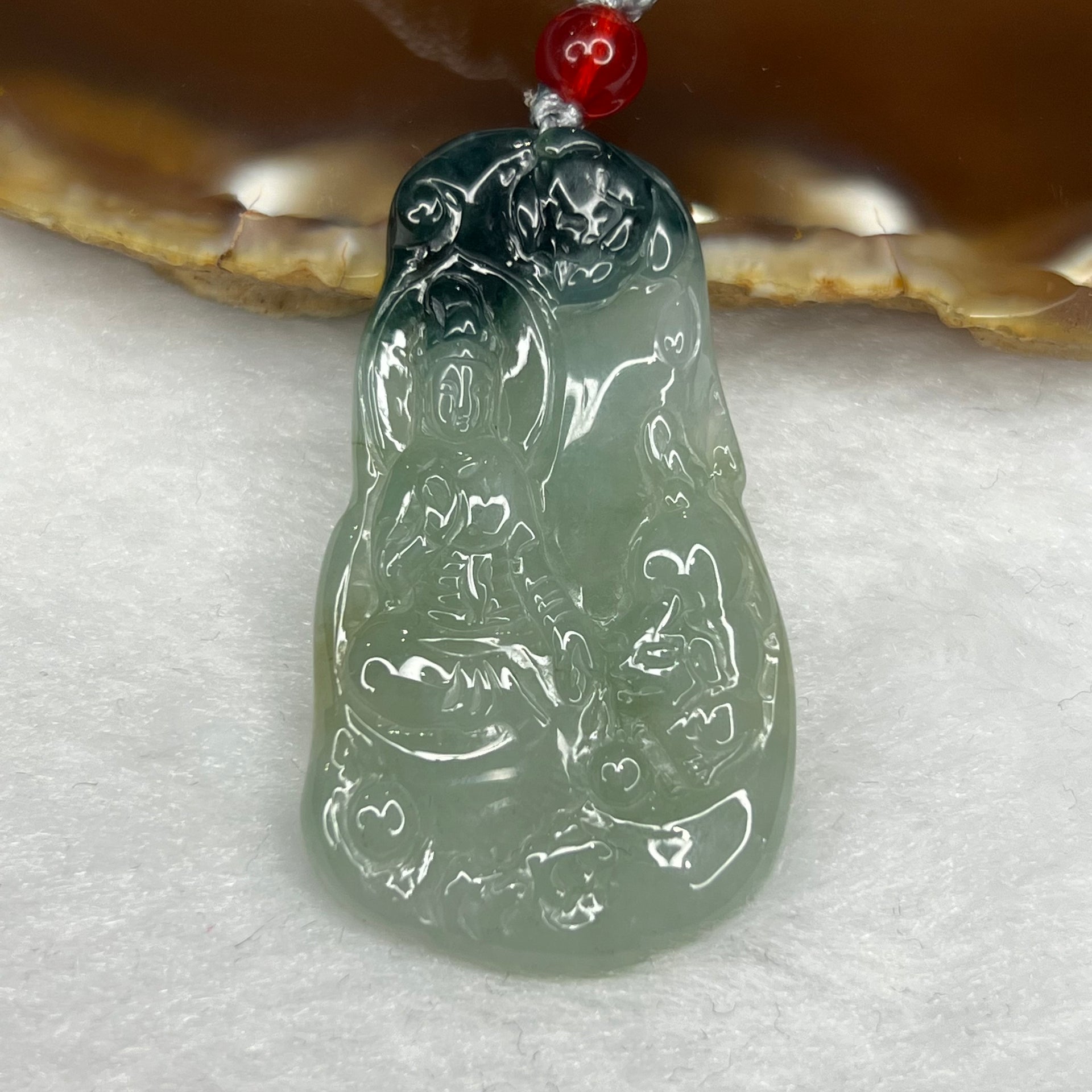 Type A Semi Icy Green Piao Hua Guan Yin Pendant 11.91g 44.3 by 25.0 by 4.1 mm - Huangs Jadeite and Jewelry Pte Ltd