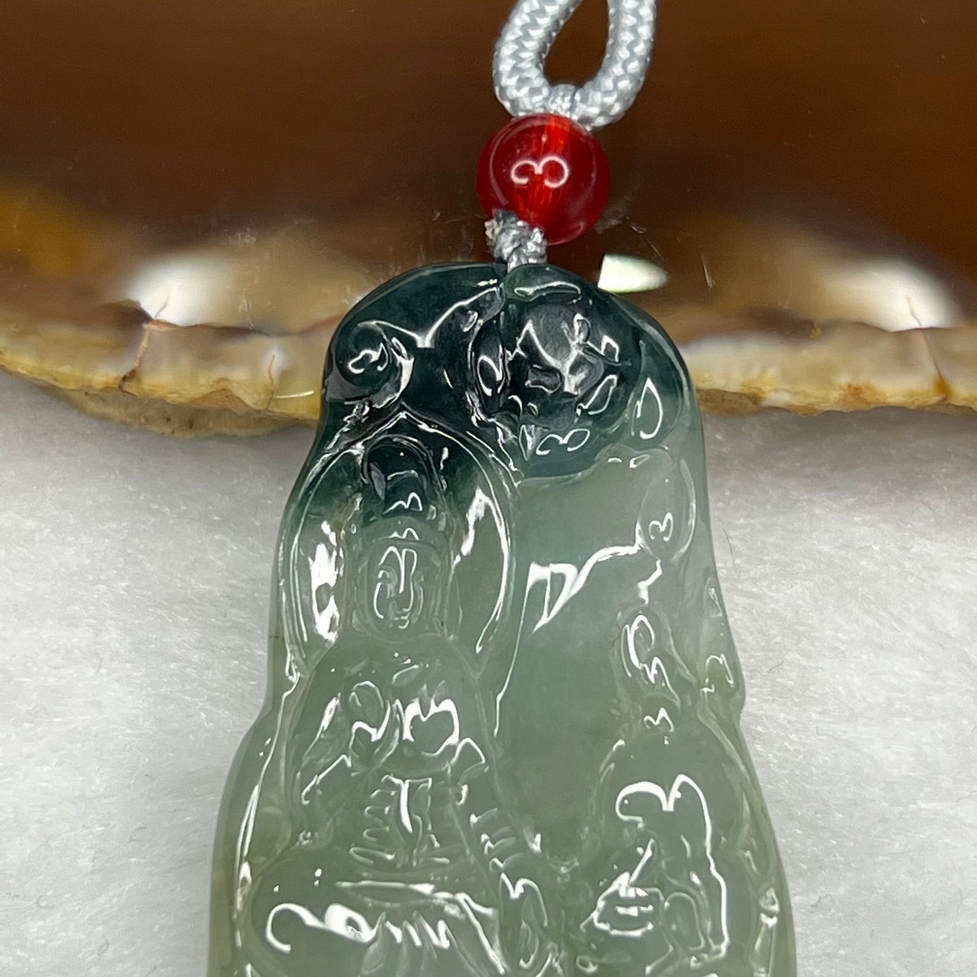 Type A Semi Icy Green Piao Hua Guan Yin Pendant 11.91g 44.3 by 25.0 by 4.1 mm - Huangs Jadeite and Jewelry Pte Ltd