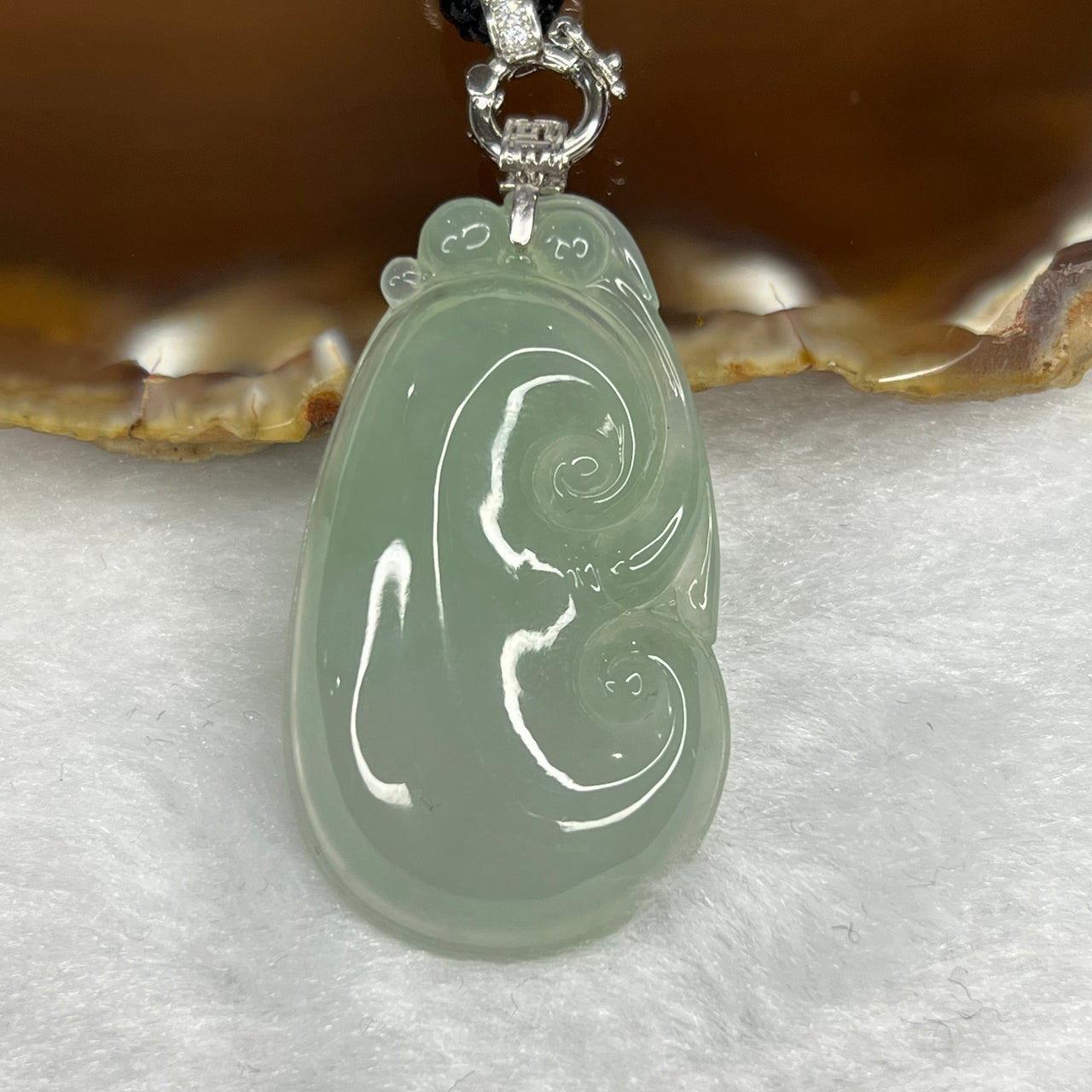 Type A Semi Icy Green Ruyi Pendant with 18k White Gold Clasp 14.46g 46.6 by 23.8 by 6.3 mm - Huangs Jadeite and Jewelry Pte Ltd