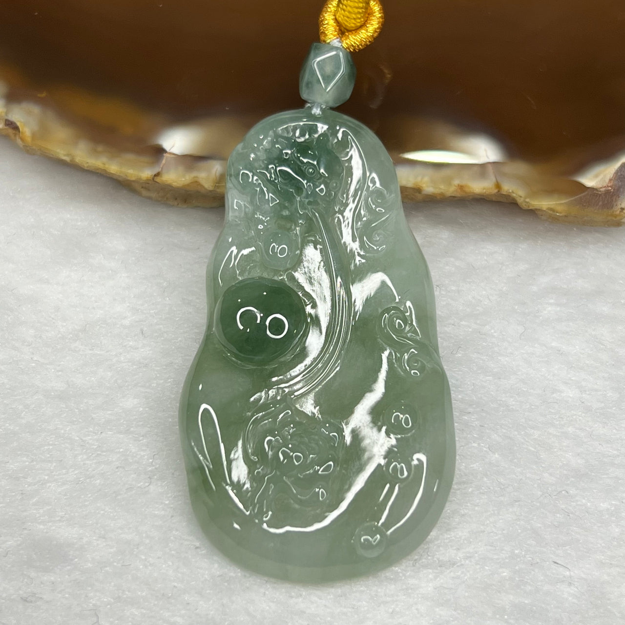 Type A Semi Icy Green Pixiu Pendant 19.56g 49.2 by 27.6 by 6.7 mm - Huangs Jadeite and Jewelry Pte Ltd