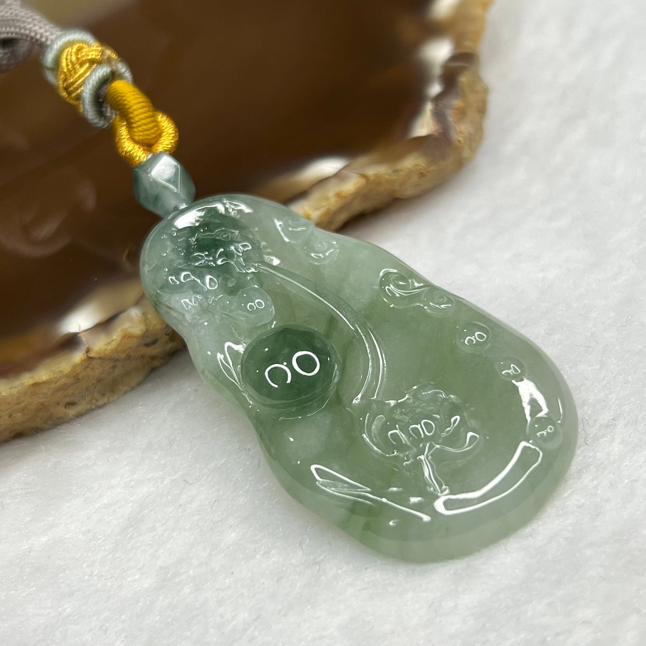 Type A Semi Icy Green Pixiu Pendant 19.56g 49.2 by 27.6 by 6.7 mm - Huangs Jadeite and Jewelry Pte Ltd