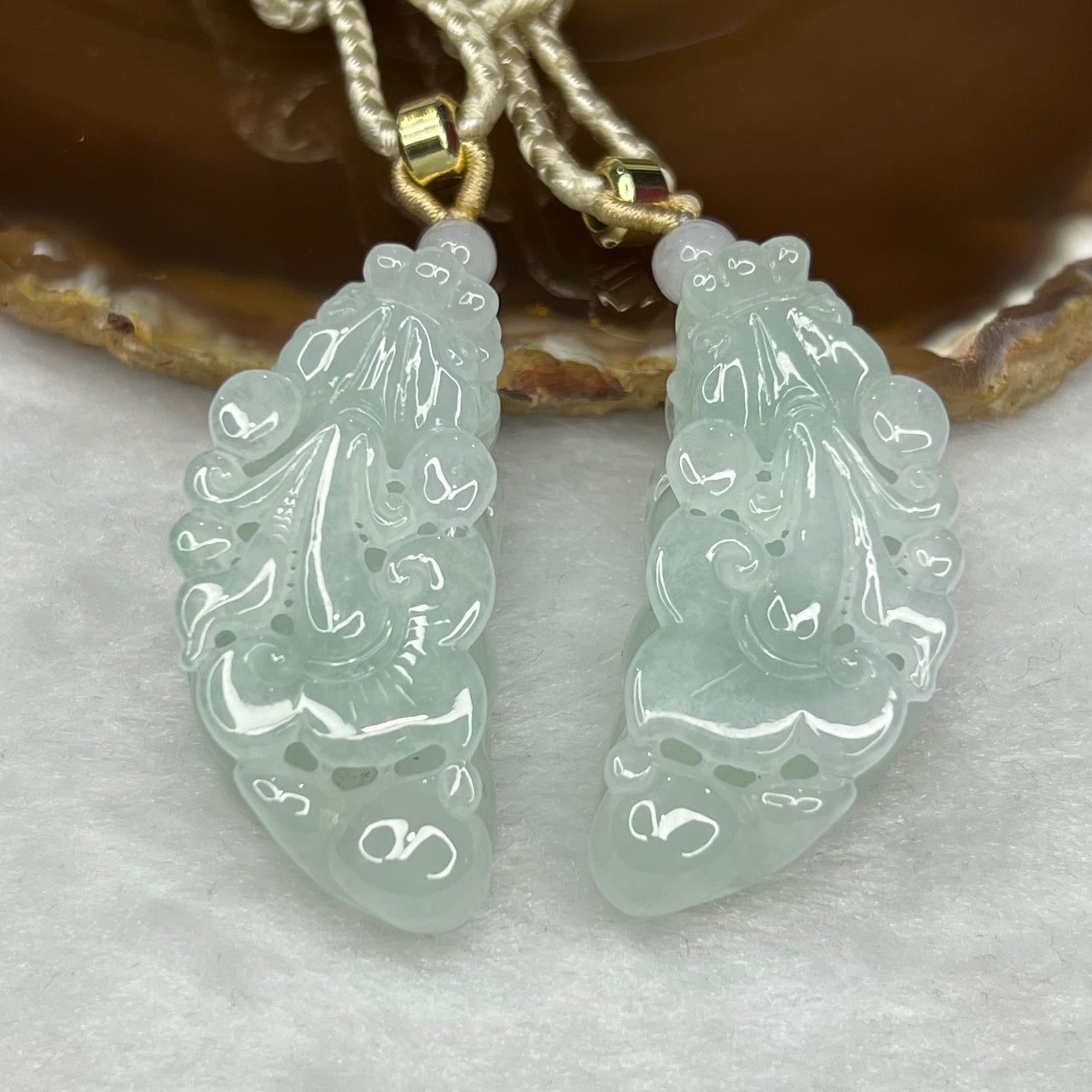 Type A Semi Icy Sky Blue Pair of Pixiu Pendants 59.76g 31.90g 47.2 by 22.4 by 13.6 Each - Huangs Jadeite and Jewelry Pte Ltd