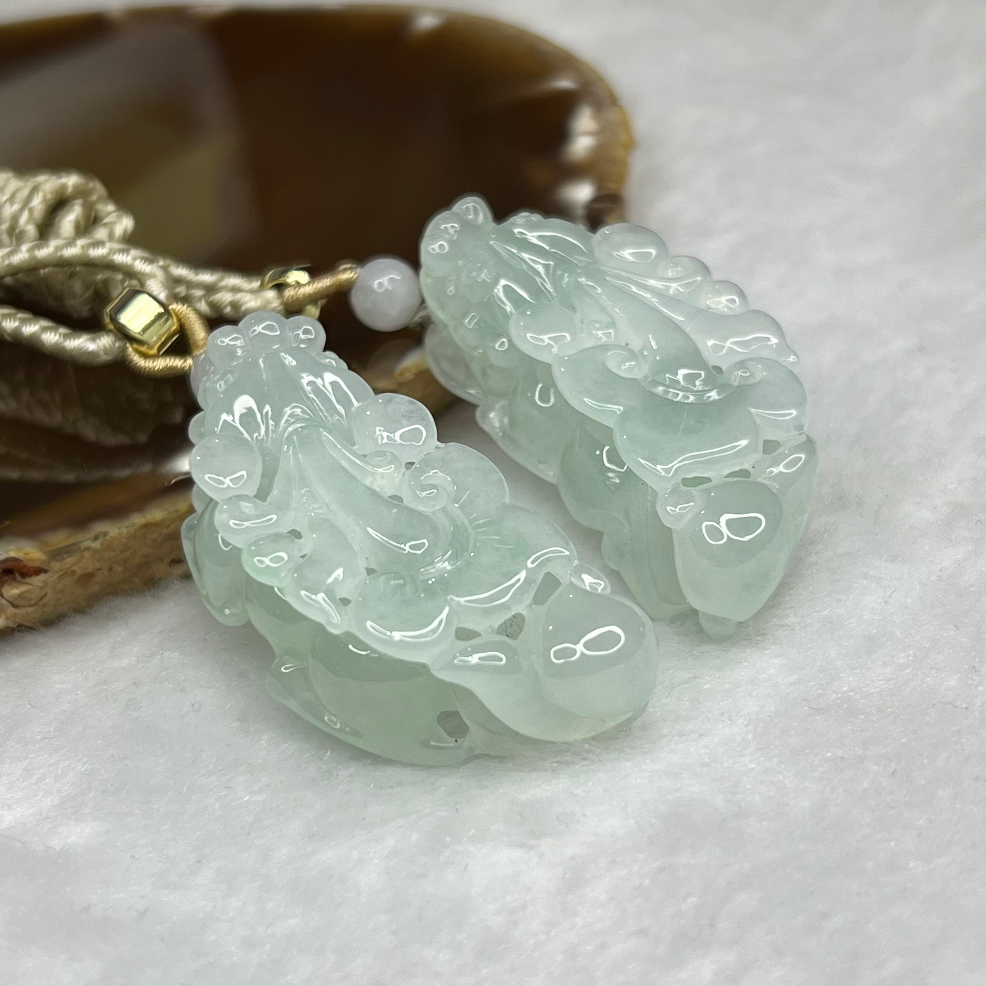 Type A Semi Icy Sky Blue Pair of Pixiu Pendants 59.76g 31.90g 47.2 by 22.4 by 13.6 Each - Huangs Jadeite and Jewelry Pte Ltd