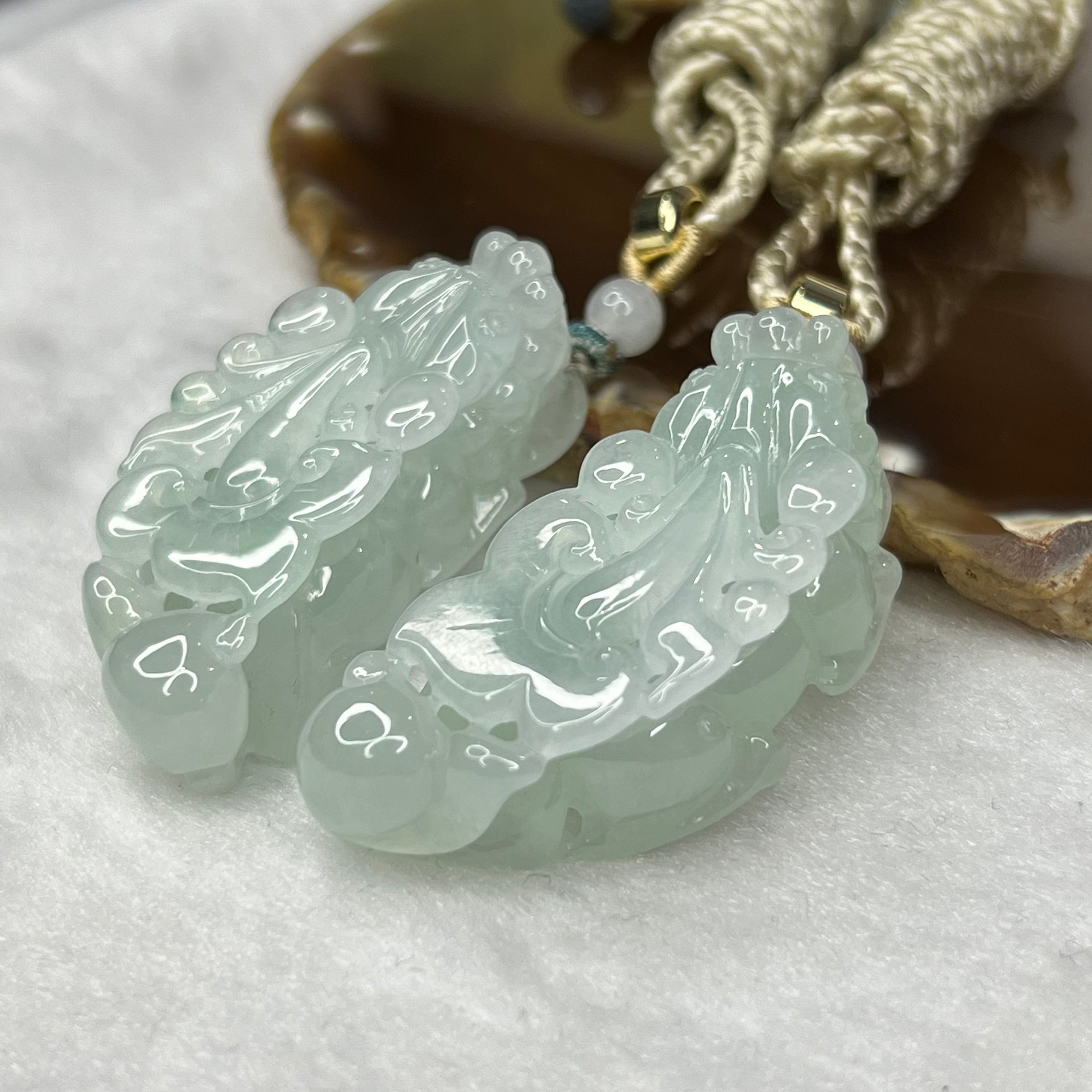 Type A Semi Icy Sky Blue Pair of Pixiu Pendants 59.76g 31.90g 47.2 by 22.4 by 13.6 Each - Huangs Jadeite and Jewelry Pte Ltd