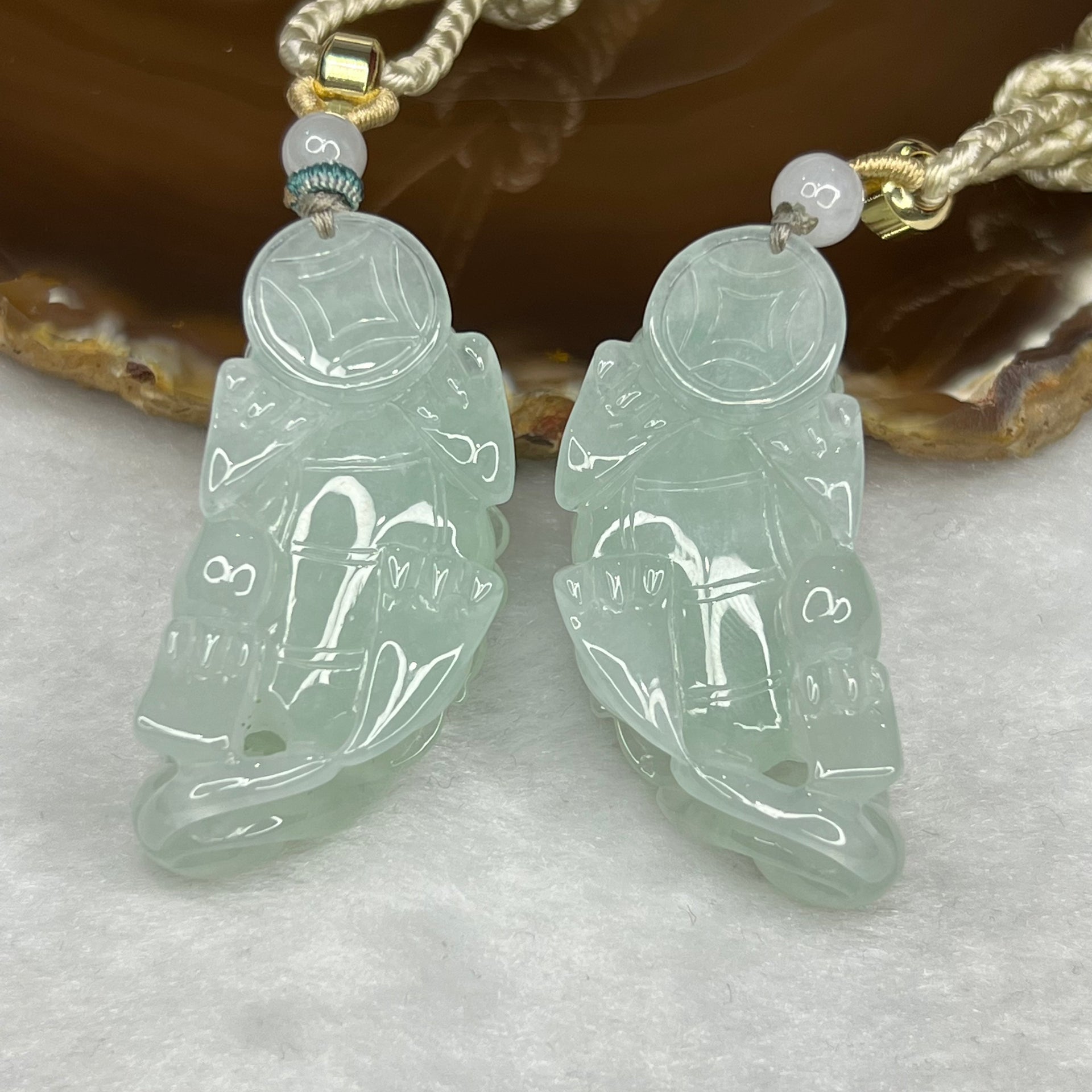 Type A Semi Icy Sky Blue Pair of Pixiu Pendants 59.76g 31.90g 47.2 by 22.4 by 13.6 Each - Huangs Jadeite and Jewelry Pte Ltd