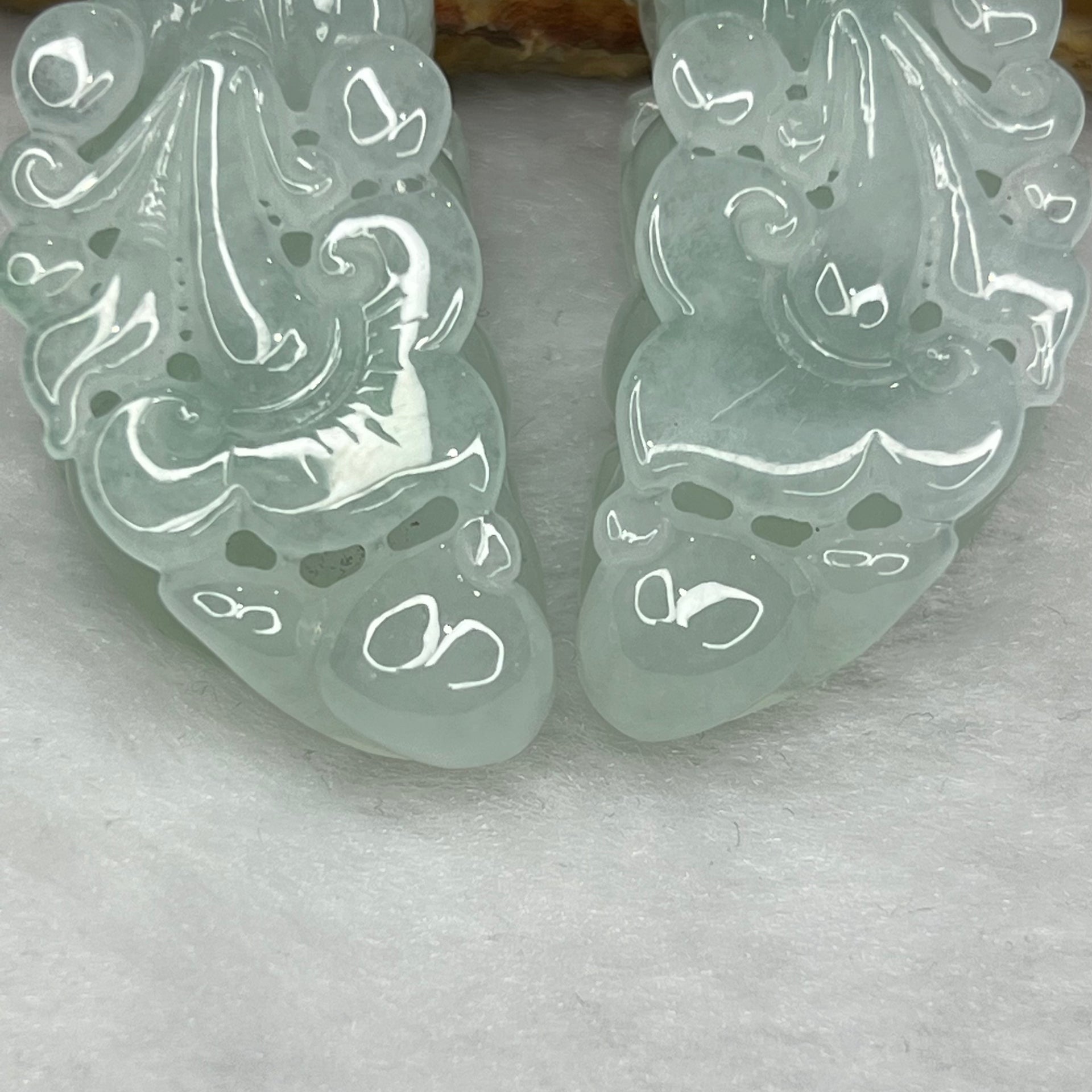 Type A Semi Icy Sky Blue Pair of Pixiu Pendants 59.76g 31.90g 47.2 by 22.4 by 13.6 Each - Huangs Jadeite and Jewelry Pte Ltd