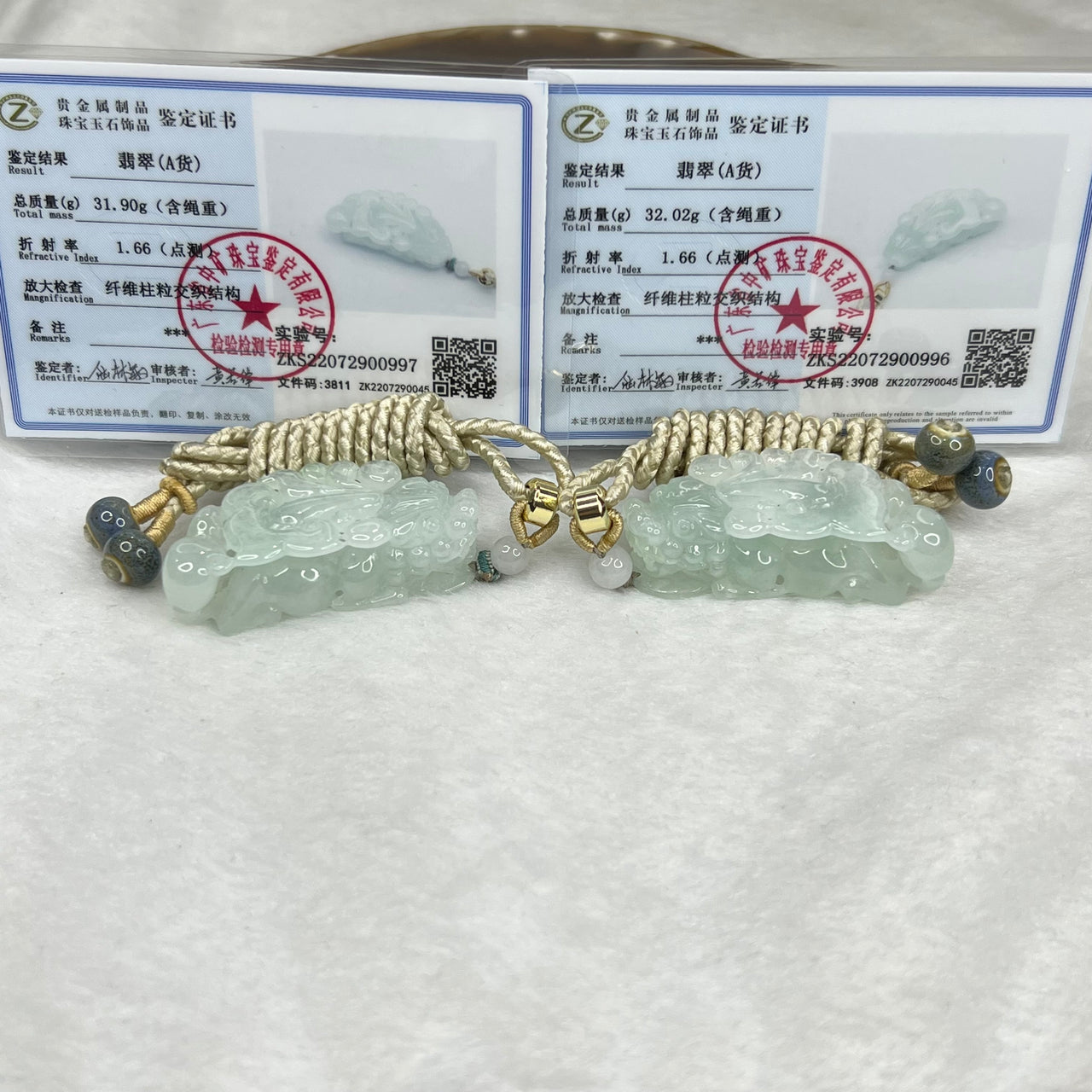 Type A Semi Icy Sky Blue Pair of Pixiu Pendants 59.76g 31.90g 47.2 by 22.4 by 13.6 Each - Huangs Jadeite and Jewelry Pte Ltd