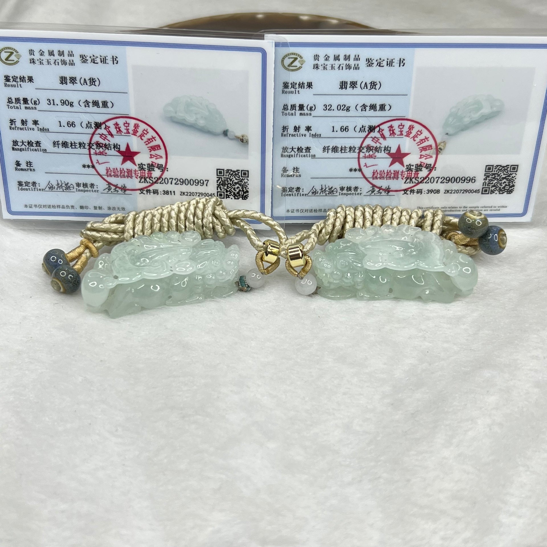 Type A Semi Icy Sky Blue Pair of Pixiu Pendants 59.76g 31.90g 47.2 by 22.4 by 13.6 Each - Huangs Jadeite and Jewelry Pte Ltd