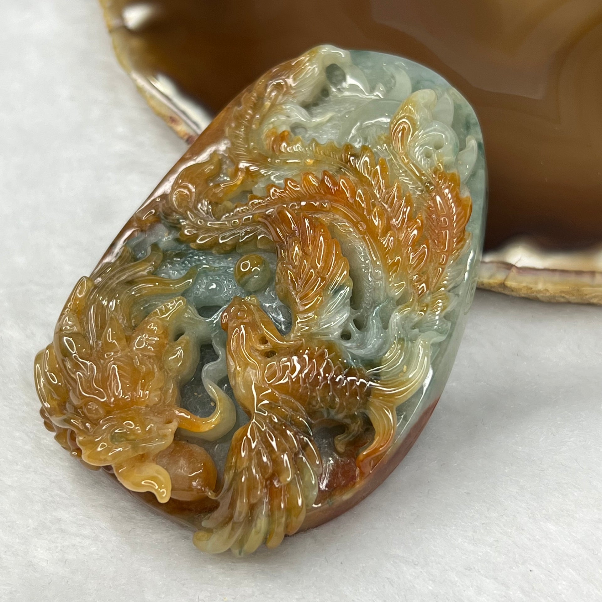 Type A Red and Green Jadeite Dragon & Phoenix Pendant 134g 78.7 by 55.4 by 21.3mm - Huangs Jadeite and Jewelry Pte Ltd