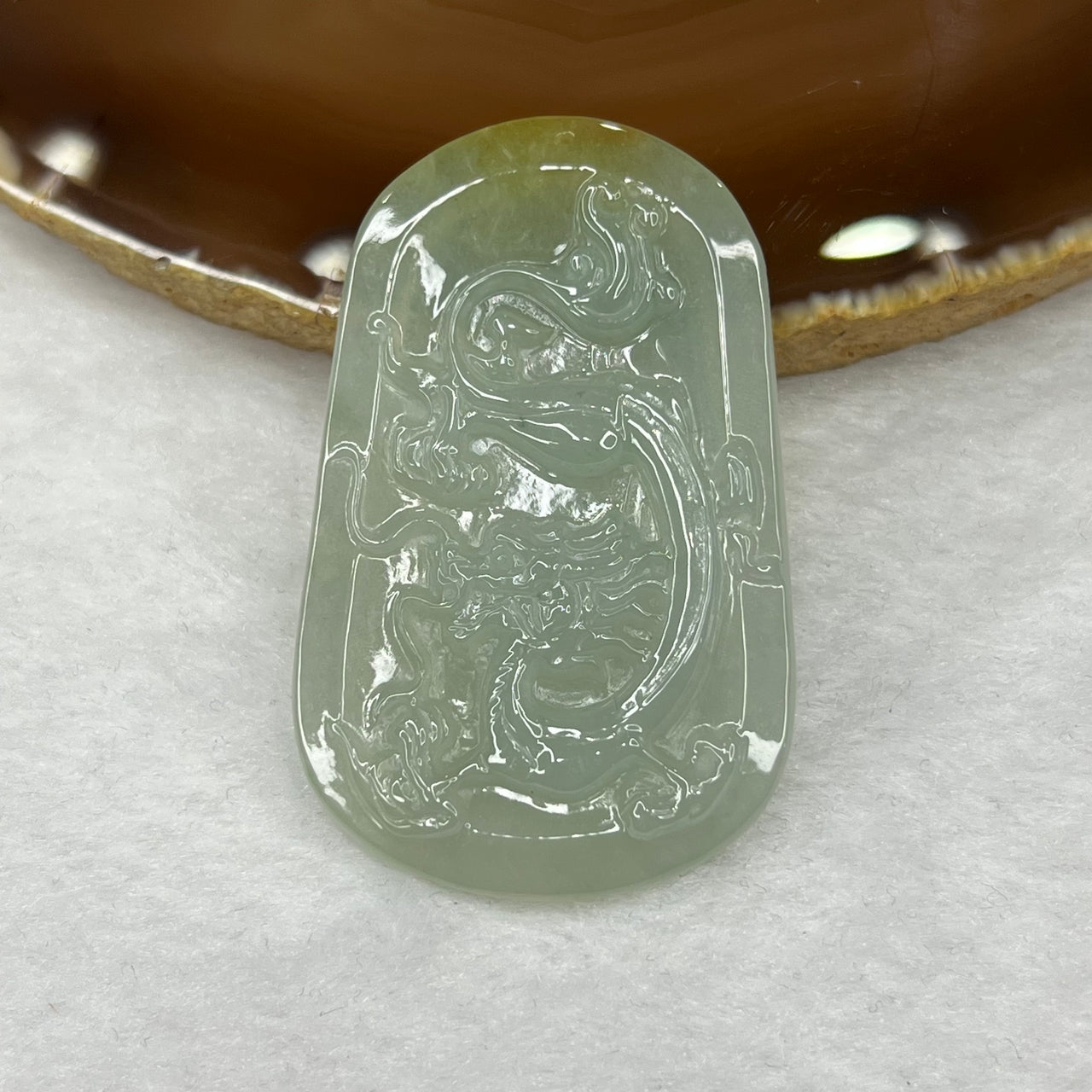 Type A Yellow and Green Jade Jadeite Phoenix Pendant 14.45g 49.4 by 34.0 by 4.5 mm - Huangs Jadeite and Jewelry Pte Ltd