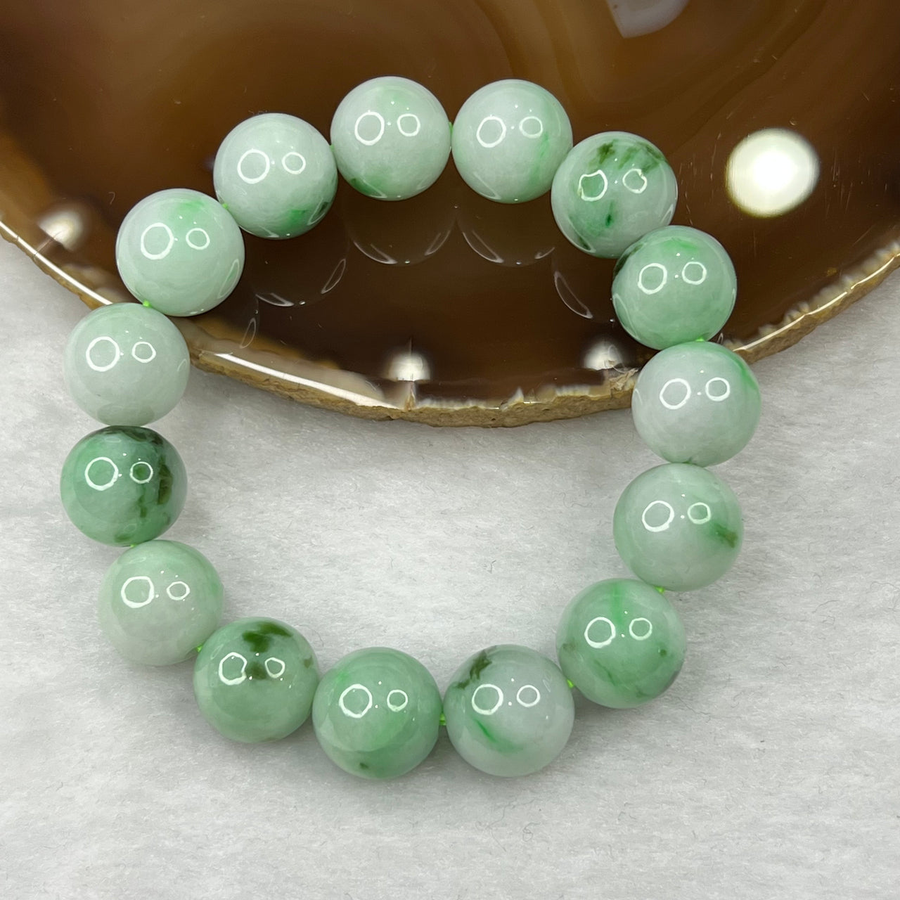 Type A Piao Hua Green Jadeite Bracelet 59.50g 13.5mm/bead 15 beads - Huangs Jadeite and Jewelry Pte Ltd