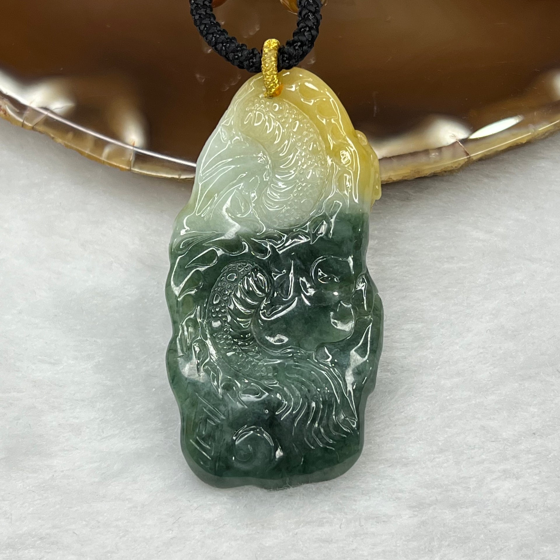 Type A Yellow and Green Jadeite Dragon and Gui Ren Pendant 36.45g 58.2 by 30.9 by 11.2mm - Huangs Jadeite and Jewelry Pte Ltd