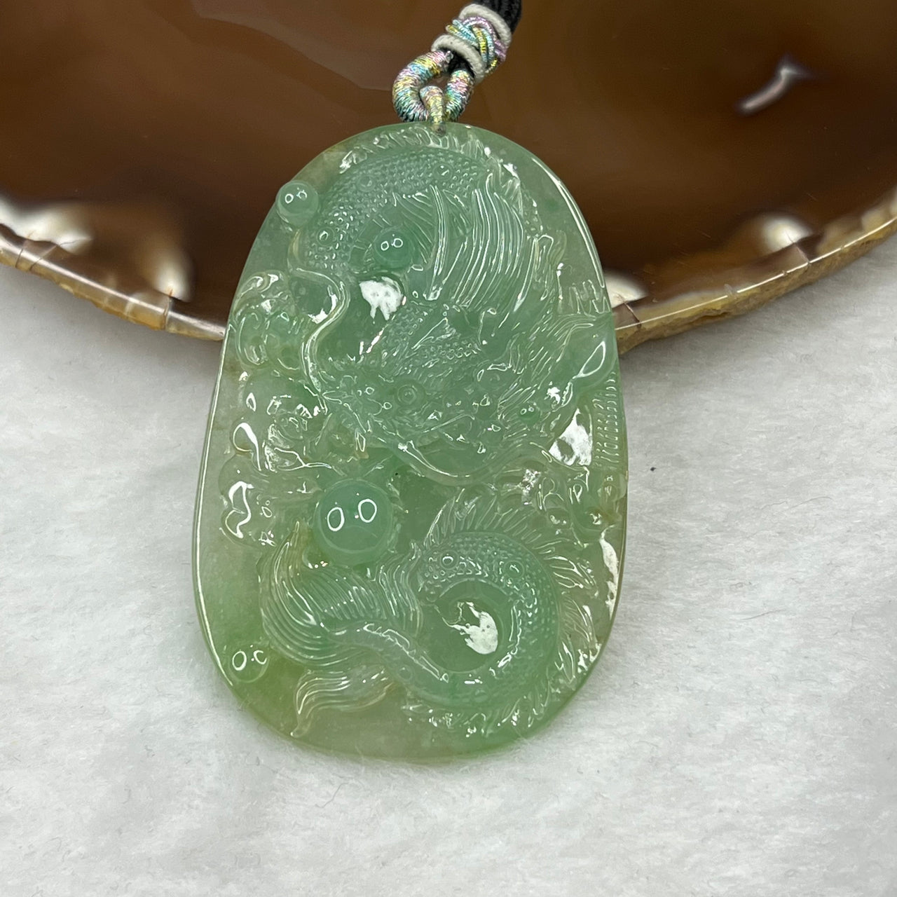 Type A Semi Icy Green Jade Jadeite Dragon Pendant 49.48g 65.9 by 43.0 by 10.5 mm - Huangs Jadeite and Jewelry Pte Ltd