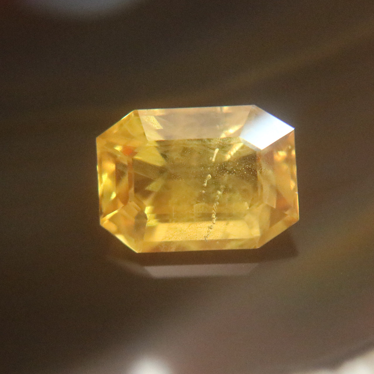 Natural Faceted Yellow Sapphire 黄宝石 with NGI Cert - 10.62 cts L14.2 W10.1 D7.2mm - Huangs Jadeite and Jewelry Pte Ltd