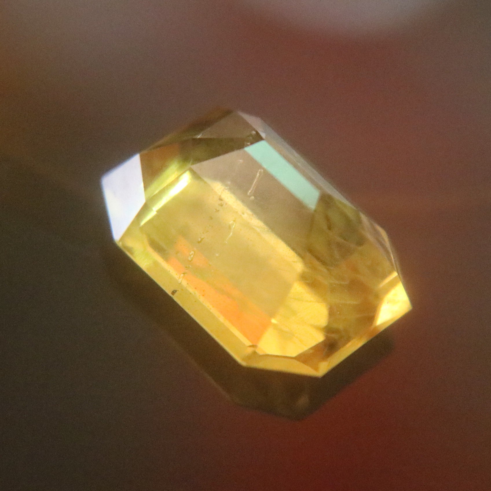 Natural Faceted Yellow Sapphire 黄宝石 with NGI Cert - 10.62 cts L14.2 W10.1 D7.2mm - Huangs Jadeite and Jewelry Pte Ltd