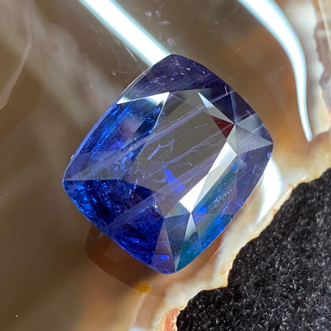 Unheated Natural Color Changing Sapphire - 53.57ct 23.18 by 18.94 by 11.69mm - Huangs Jadeite and Jewelry Pte Ltd