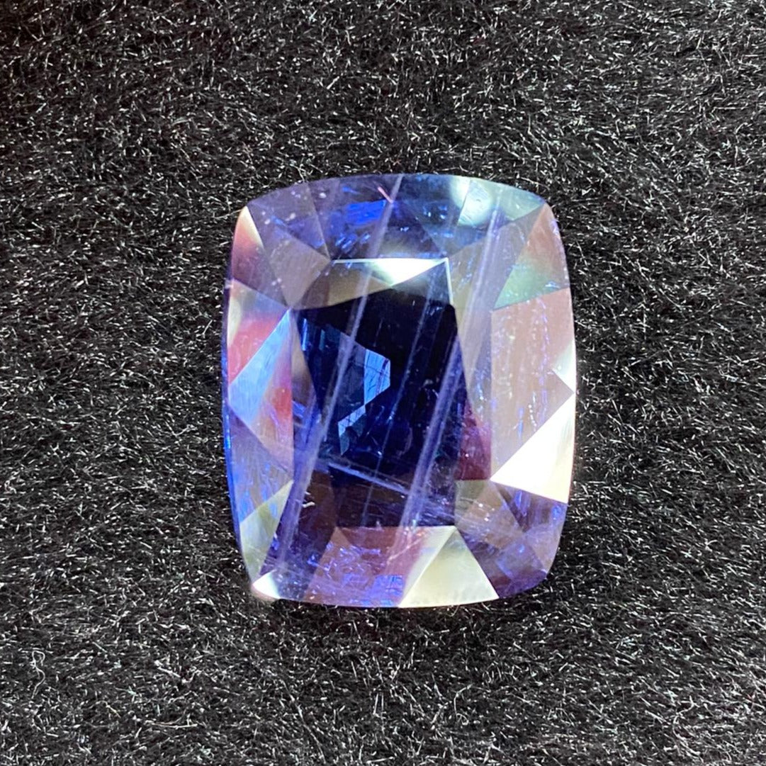 Unheated Natural Color Changing Sapphire - 53.57ct 23.18 by 18.94 by 11.69mm - Huangs Jadeite and Jewelry Pte Ltd