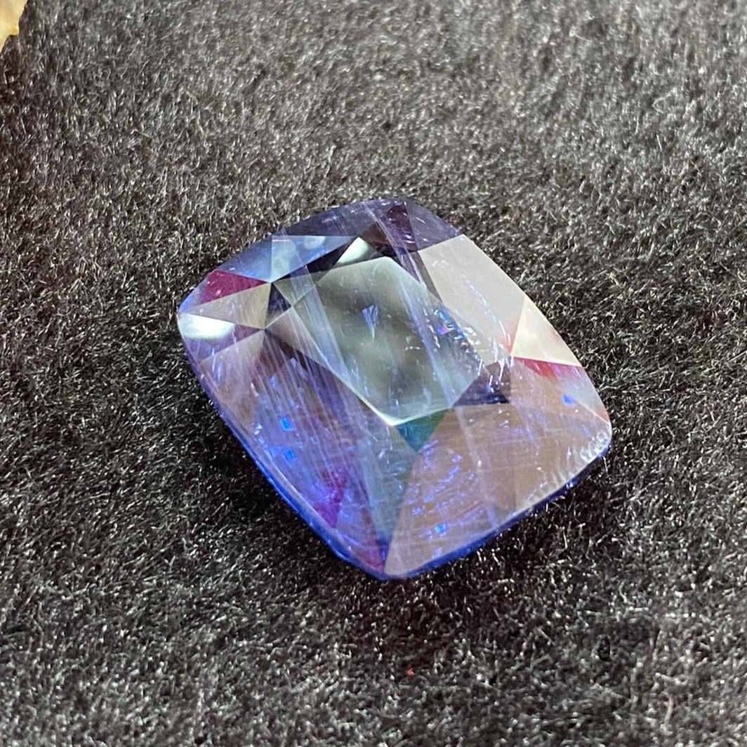 Unheated Natural Color Changing Sapphire - 53.57ct 23.18 by 18.94 by 11.69mm - Huangs Jadeite and Jewelry Pte Ltd