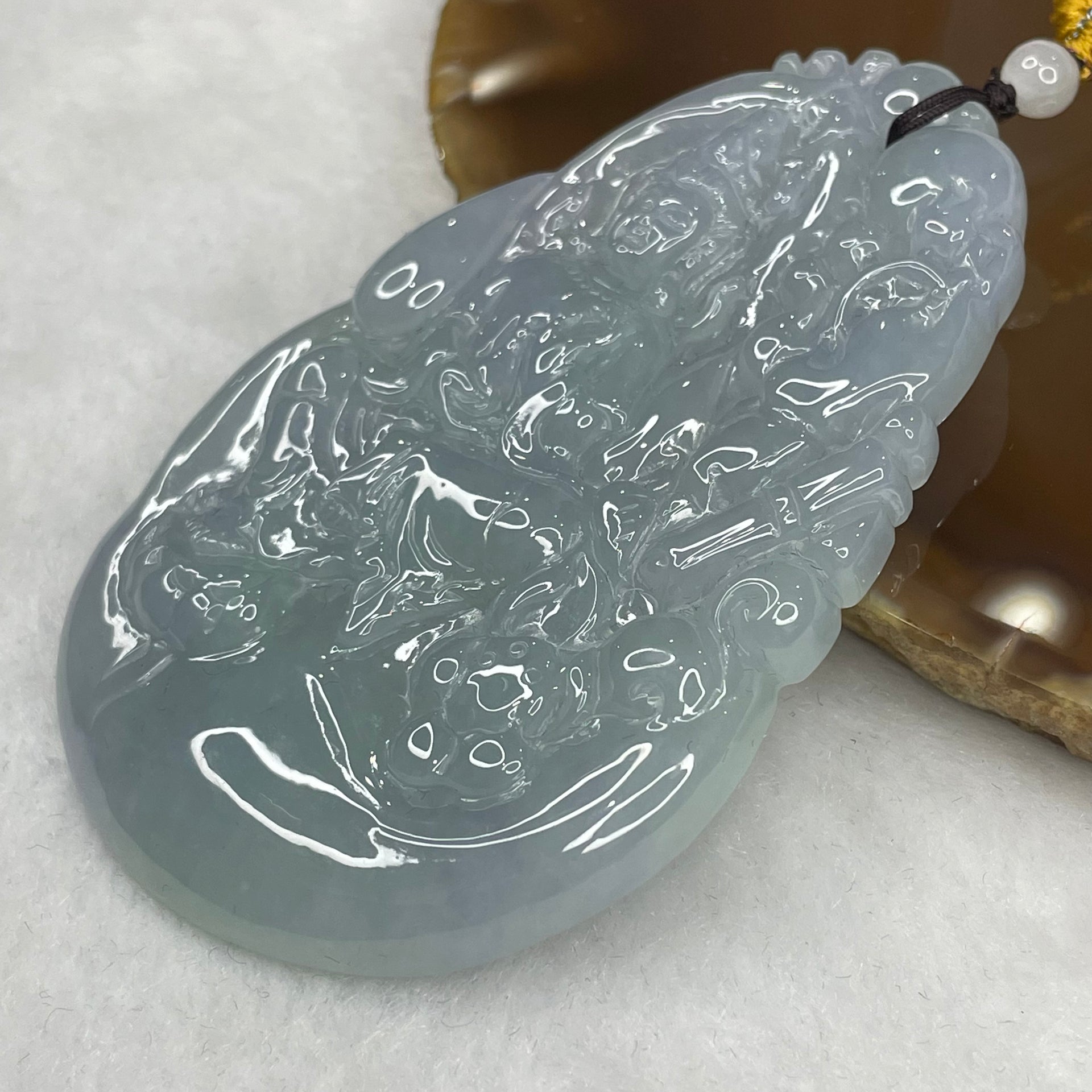 Grand Master Certified Type A Semi Icy Sky Blue Guan Yin Pendant 47.60g 75.6 by 49.5 by 6.4 mm - Huangs Jadeite and Jewelry Pte Ltd