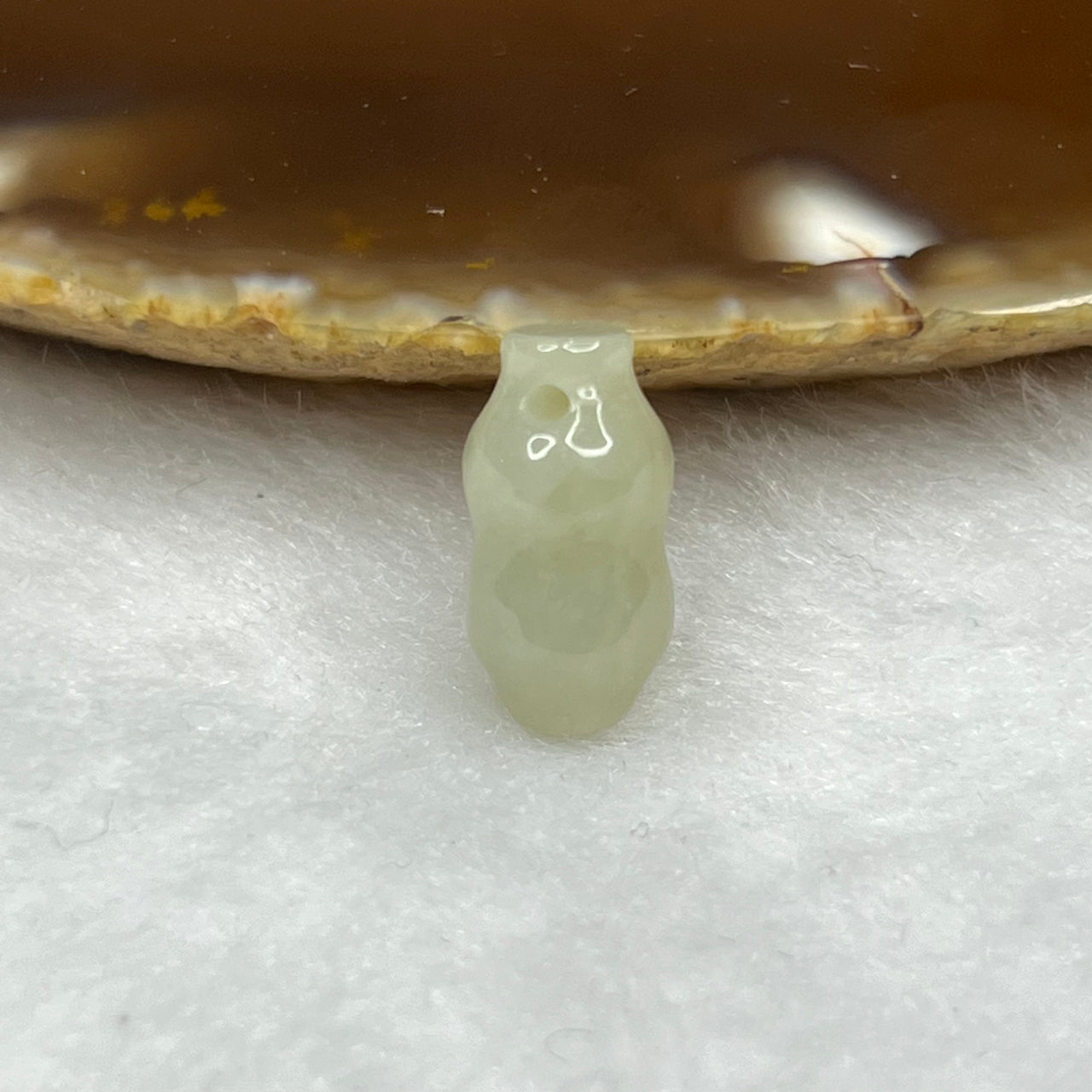 Type A Faint Yellow Jade Jadeite Peanut - 1.54g 14.2 by 7.5 by 7.5 mm - Huangs Jadeite and Jewelry Pte Ltd