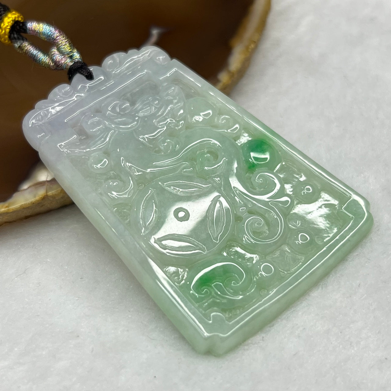 Type A Semi Icy Green and Faint Lavender Jade Jadeite Dragon Pendant 35.86g 62.4 by 43.1 by 5.2 mm - Huangs Jadeite and Jewelry Pte Ltd