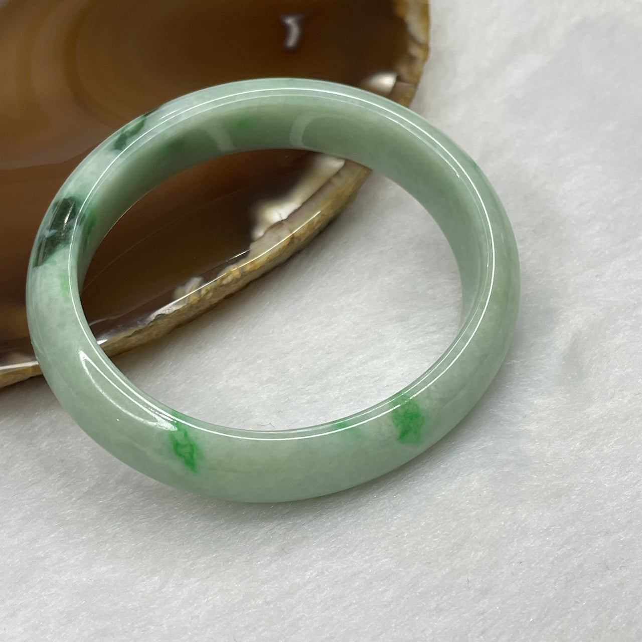 Type A Green Piao Hua Jadeite Oval Bangle 36.84g inner diameter 52.4mm 11.8 by 6.8mm - Huangs Jadeite and Jewelry Pte Ltd