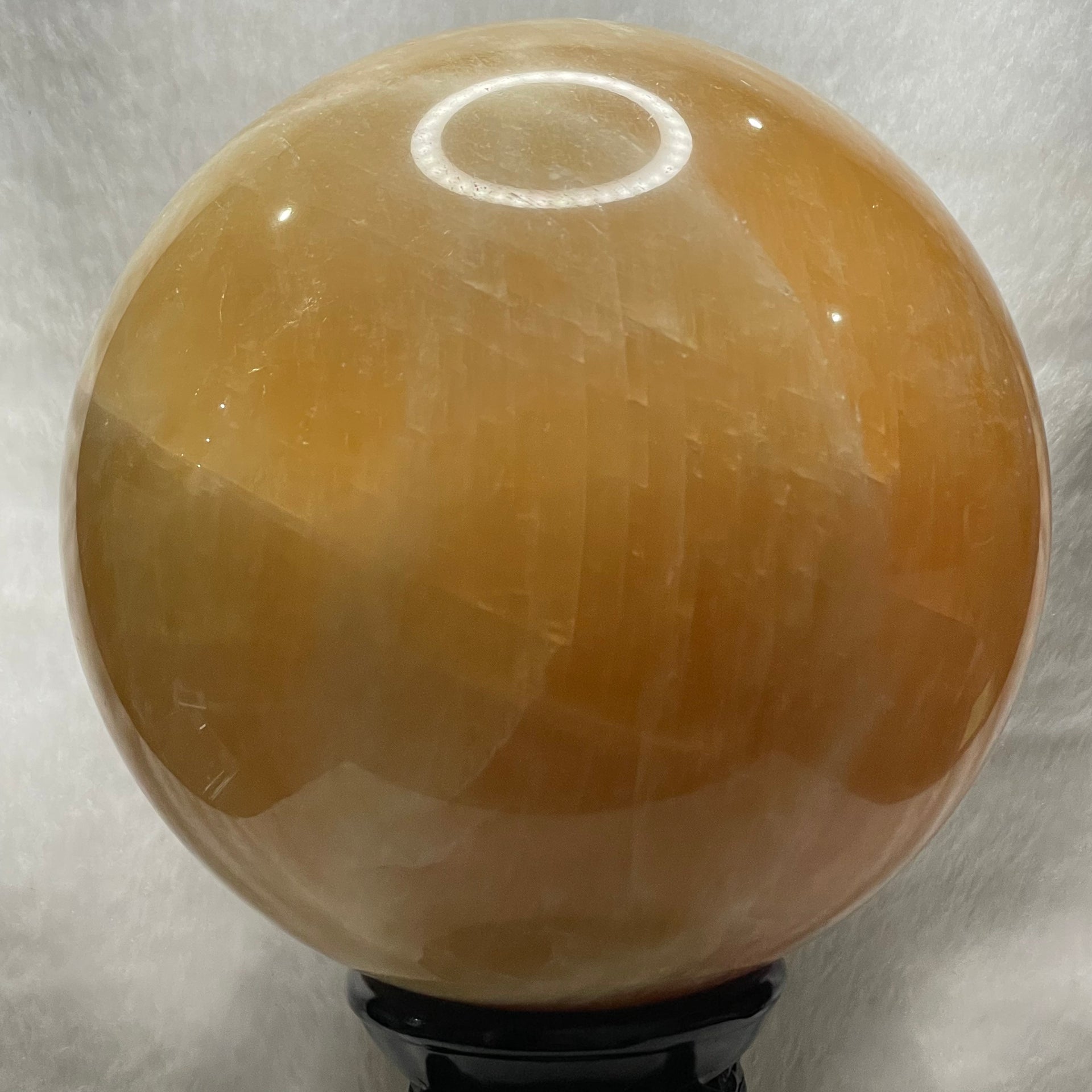 Natural Citrine Crystal Ball Display with Wooden Stand - 6555g Dimensions with Stand: 253.9 by 242.5 by 165.9mm Crystal Ball Dimensions: 139.2 by 139.2mm - Huangs Jadeite and Jewelry Pte Ltd