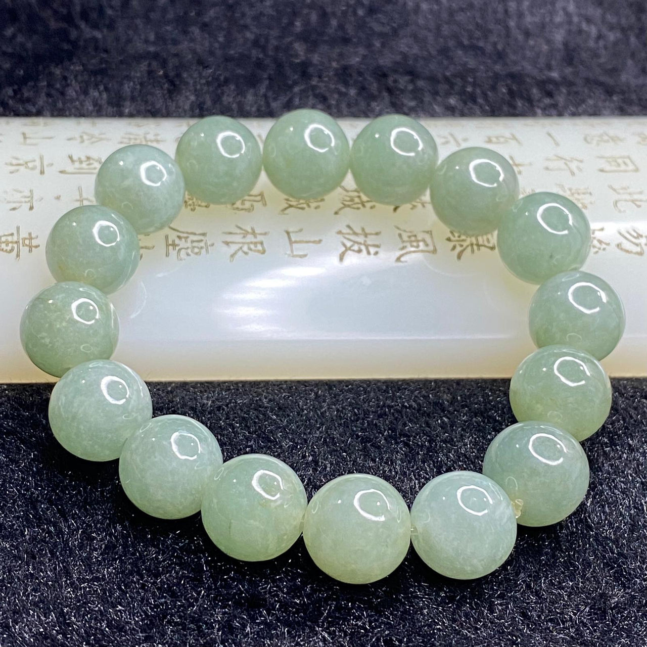 Type A Light Oily Green Jadeite Bracelet 62.33g 13.3mm 16 Beads - Huangs Jadeite and Jewelry Pte Ltd