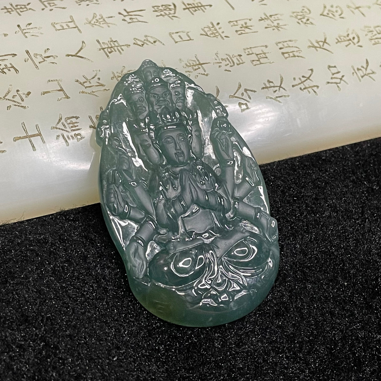 Type A Blueish Green Jade Jadeite thousand hands Guan Yin 30.29g 58.5 by 36.0 by 7.3mm - Huangs Jadeite and Jewelry Pte Ltd