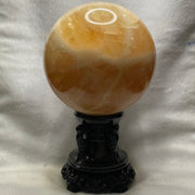 Natural Citrine Crystal Ball Display with Wooden Stand - 6555g Dimensions with Stand: 253.9 by 242.5 by 165.9mm Crystal Ball Dimensions: 139.2 by 139.2mm - Huangs Jadeite and Jewelry Pte Ltd