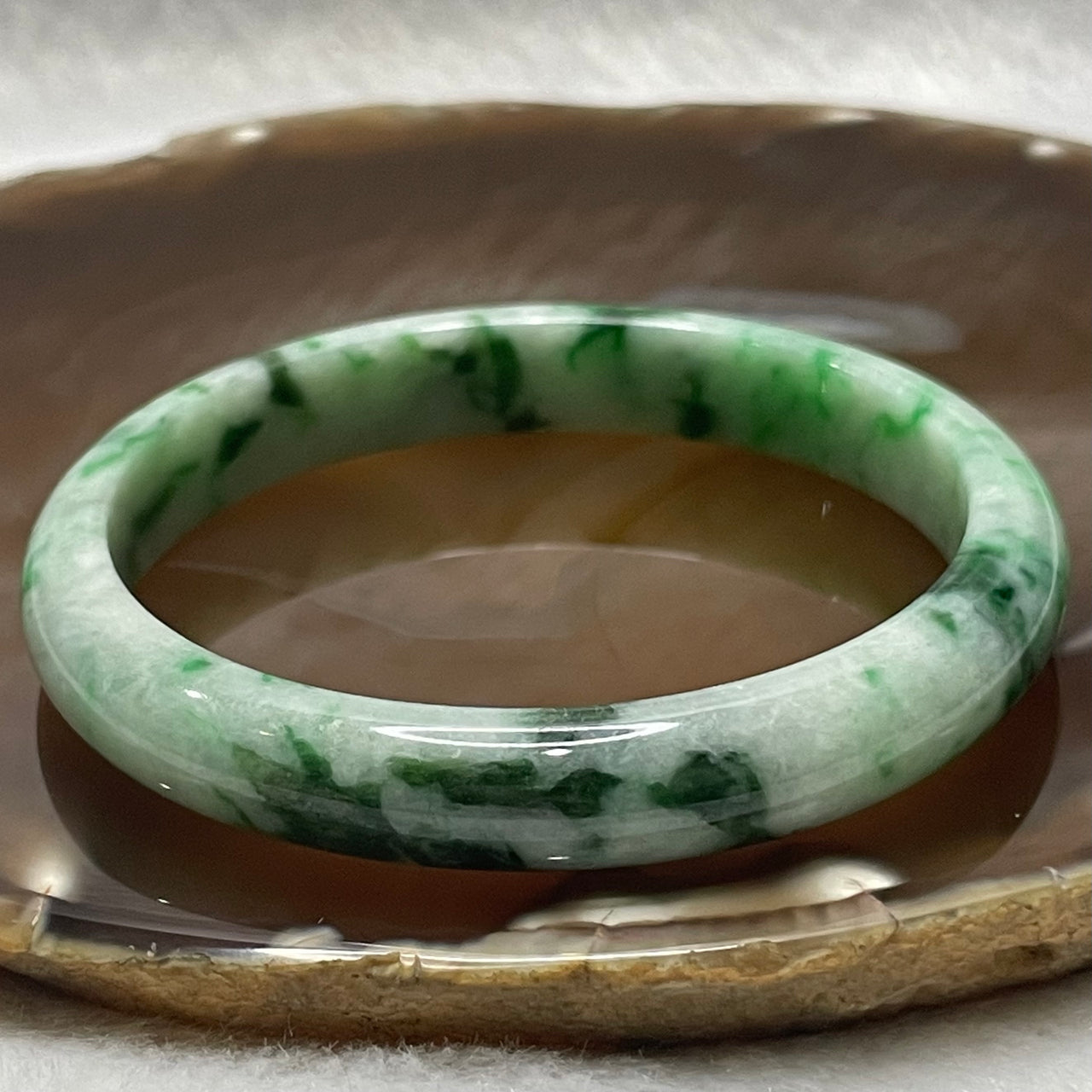 Type A Light Green with Green Patches Jade Jadeite Bangle - 35.02g Inner Diameter 56.8mm Thickness 9.9 by 6.8mm - Huangs Jadeite and Jewelry Pte Ltd