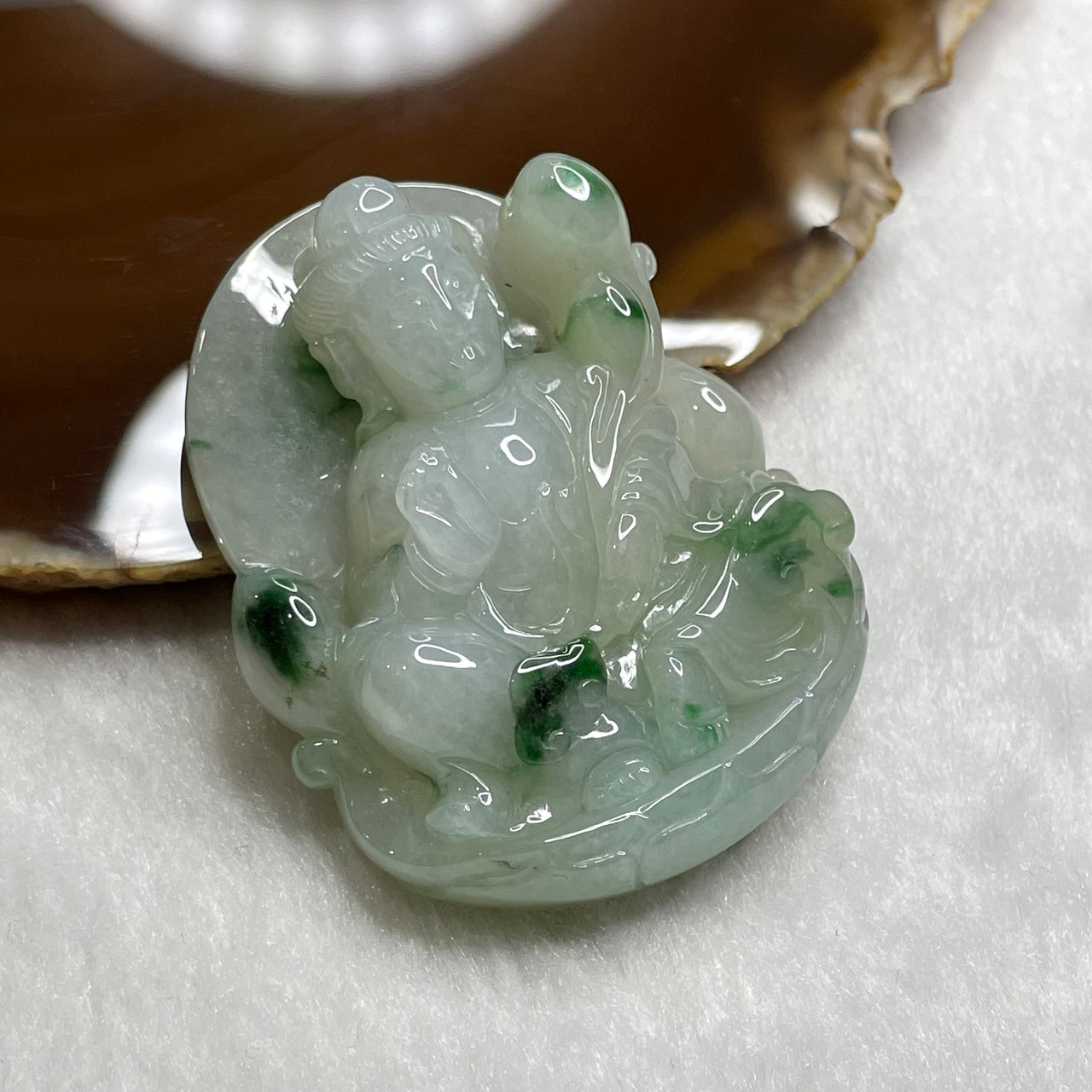 Type A Semi Icy Piao Hua Guan Yin Jade Jadeite 55.08g 52.2 by 42.3 by 13.5mm - Huangs Jadeite and Jewelry Pte Ltd