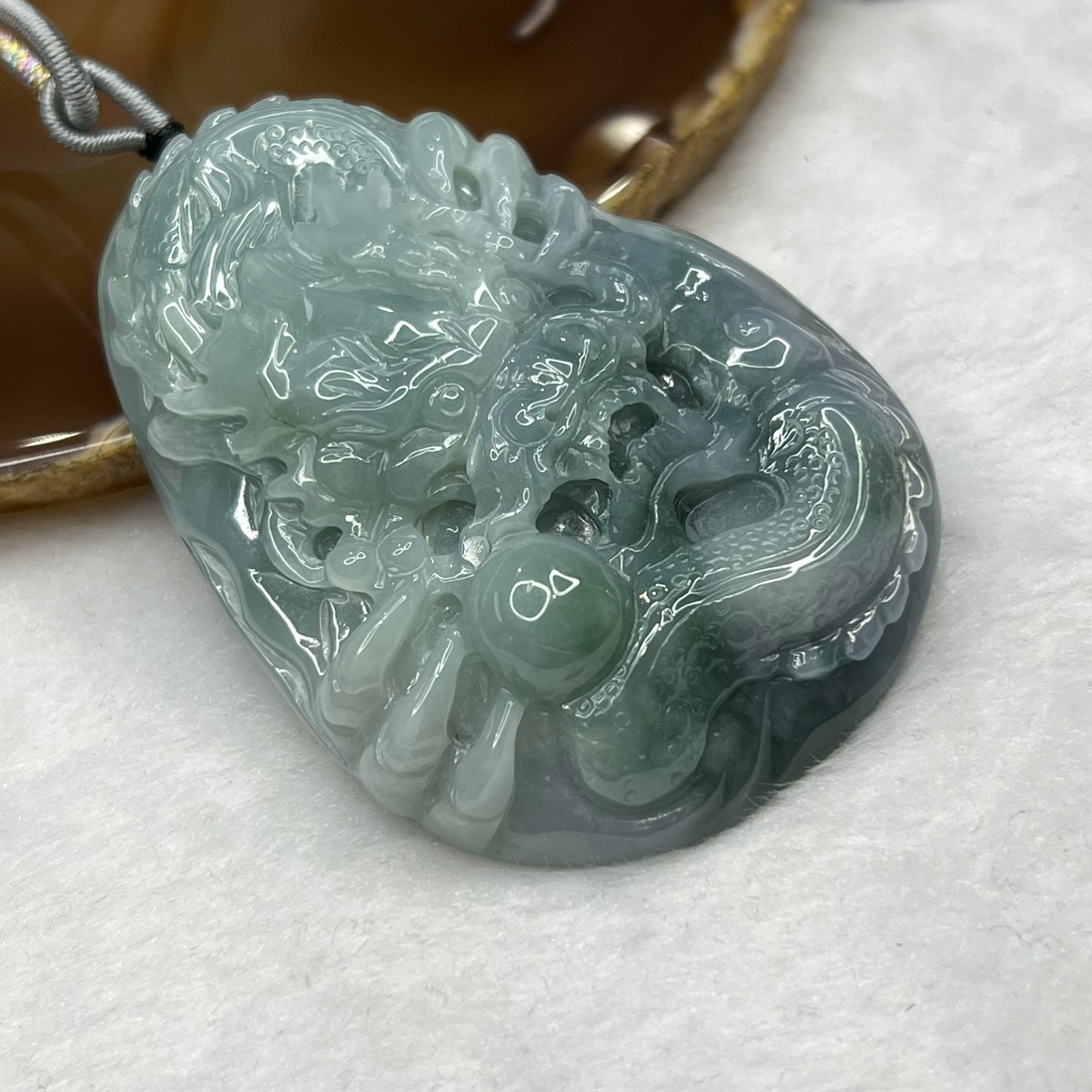 Type A Blueish Green and Lavender Jadeite Dragon Pendant 96.85g 73.0 by 51.0 by 15.8mm Feng Shui SG - Huangs Jadeite and Jewelry Pte Ltd