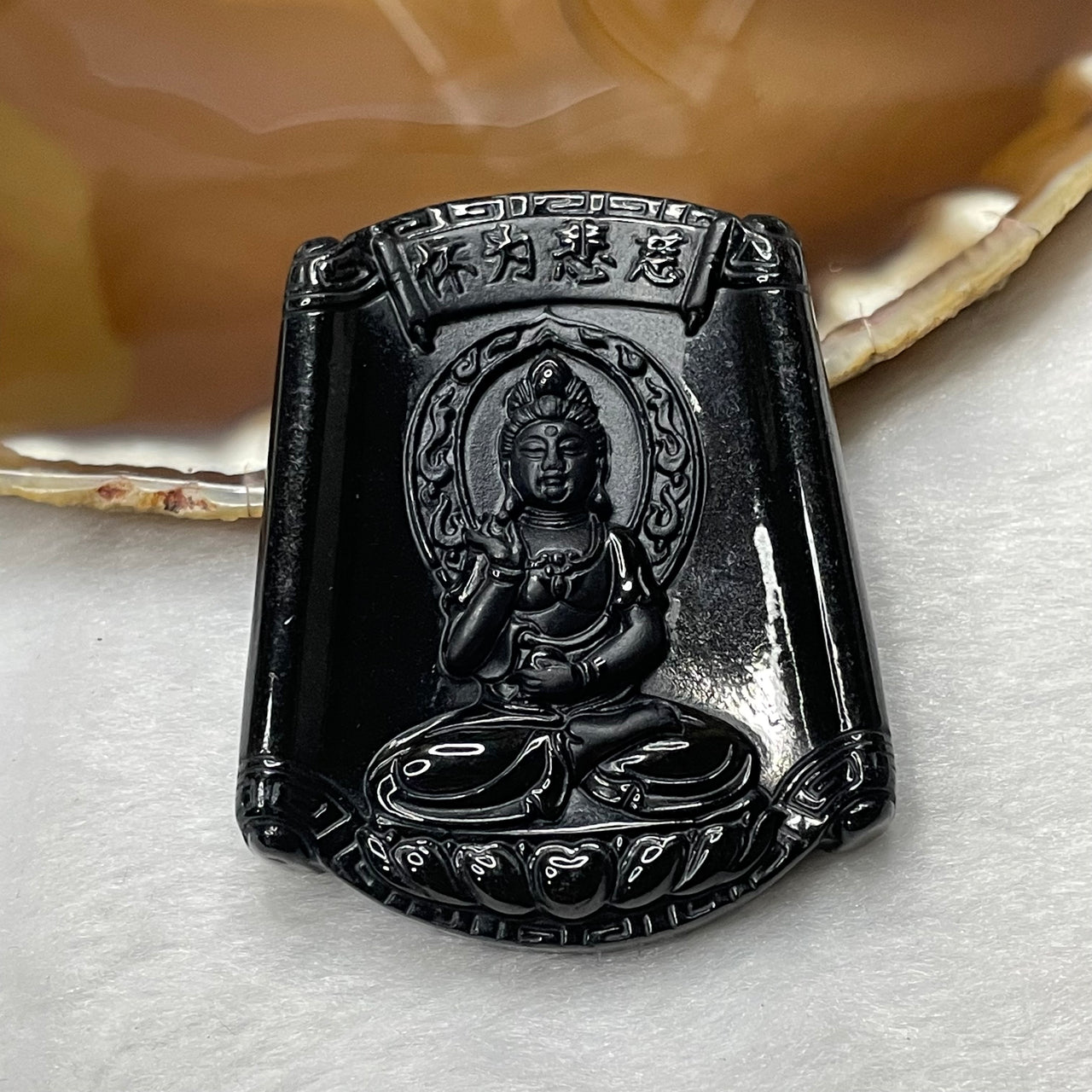 Type A Black Jade Jadeite Guan Yin 慈悲为怀 30.32g 58.8 by 46.0 by 9.3mm - Huangs Jadeite and Jewelry Pte Ltd