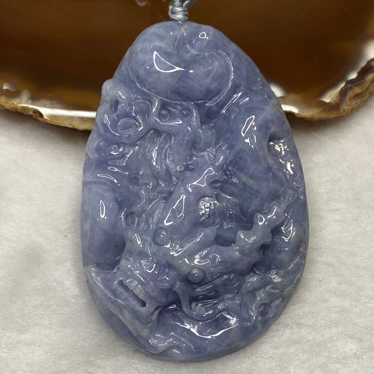 Type A Very Deep Lavender Jadeite Dragon 61.81g 71.1 by 46.9 by 11.8mm - Huangs Jadeite and Jewelry Pte Ltd