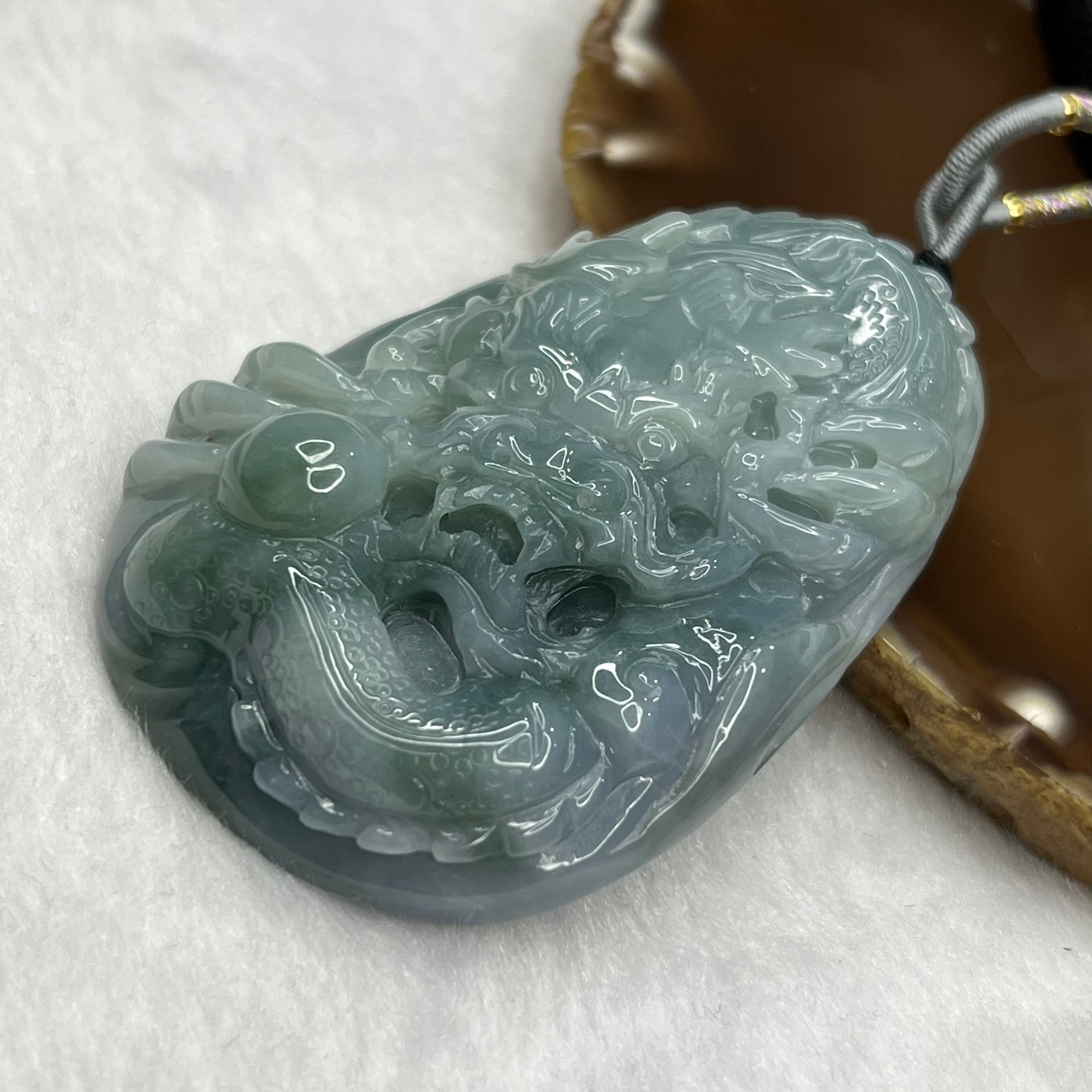 Type A Blueish Green and Lavender Jadeite Dragon Pendant 96.85g 73.0 by 51.0 by 15.8mm Feng Shui SG - Huangs Jadeite and Jewelry Pte Ltd