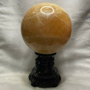 Natural Citrine Crystal Ball Display with Wooden Stand - 6555g Dimensions with Stand: 253.9 by 242.5 by 165.9mm Crystal Ball Dimensions: 139.2 by 139.2mm - Huangs Jadeite and Jewelry Pte Ltd