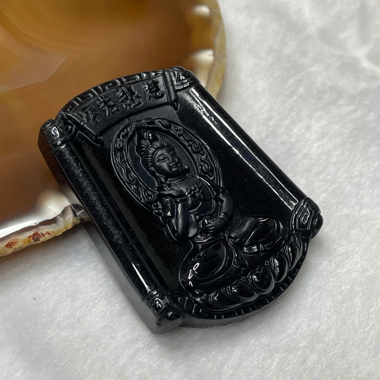 Type A Black Jade Jadeite Guan Yin 慈悲为怀 30.32g 58.8 by 46.0 by 9.3mm - Huangs Jadeite and Jewelry Pte Ltd