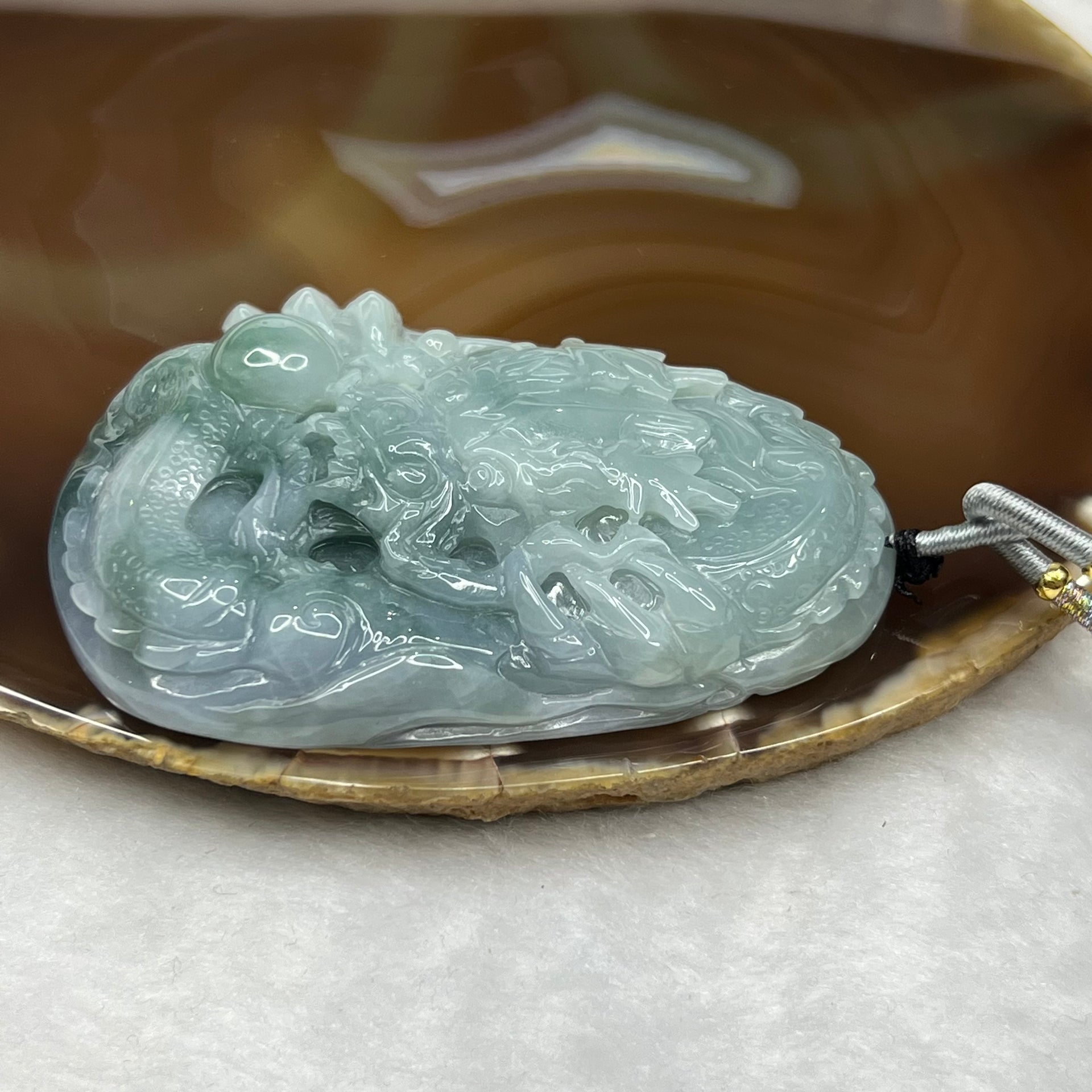 Type A Blueish Green and Lavender Jadeite Dragon Pendant 96.85g 73.0 by 51.0 by 15.8mm Feng Shui SG - Huangs Jadeite and Jewelry Pte Ltd