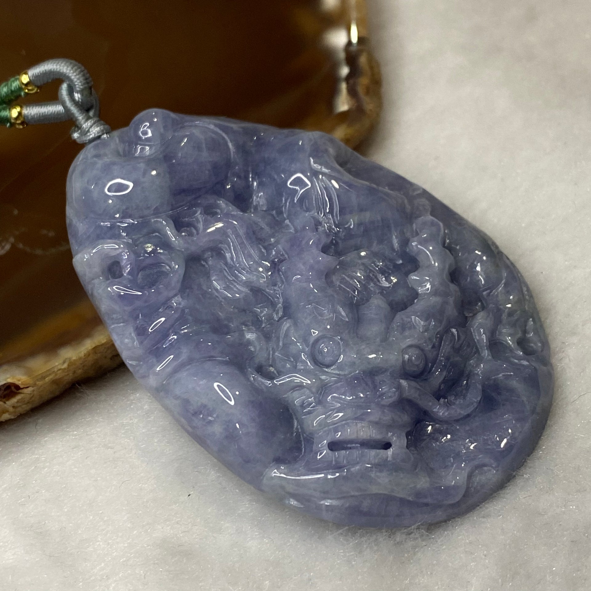 Type A Very Deep Lavender Jadeite Dragon 61.81g 71.1 by 46.9 by 11.8mm - Huangs Jadeite and Jewelry Pte Ltd