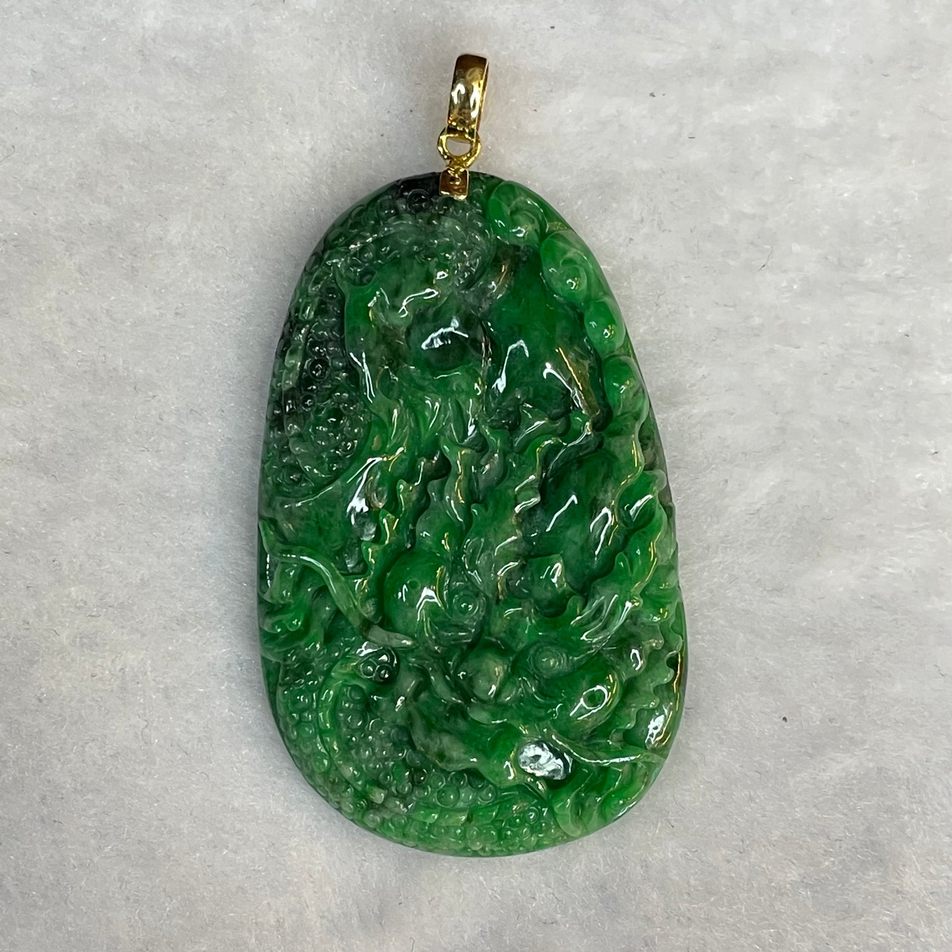 18 Yellow Gold Rare Type A Green with Dark Green Patches Jade Jadeite Prosperity Dragon Feng Shui Pendant with NGI Cert 142.63 cts 57.91 by 36.09 by 7.43mm - Huangs Jadeite and Jewelry Pte Ltd