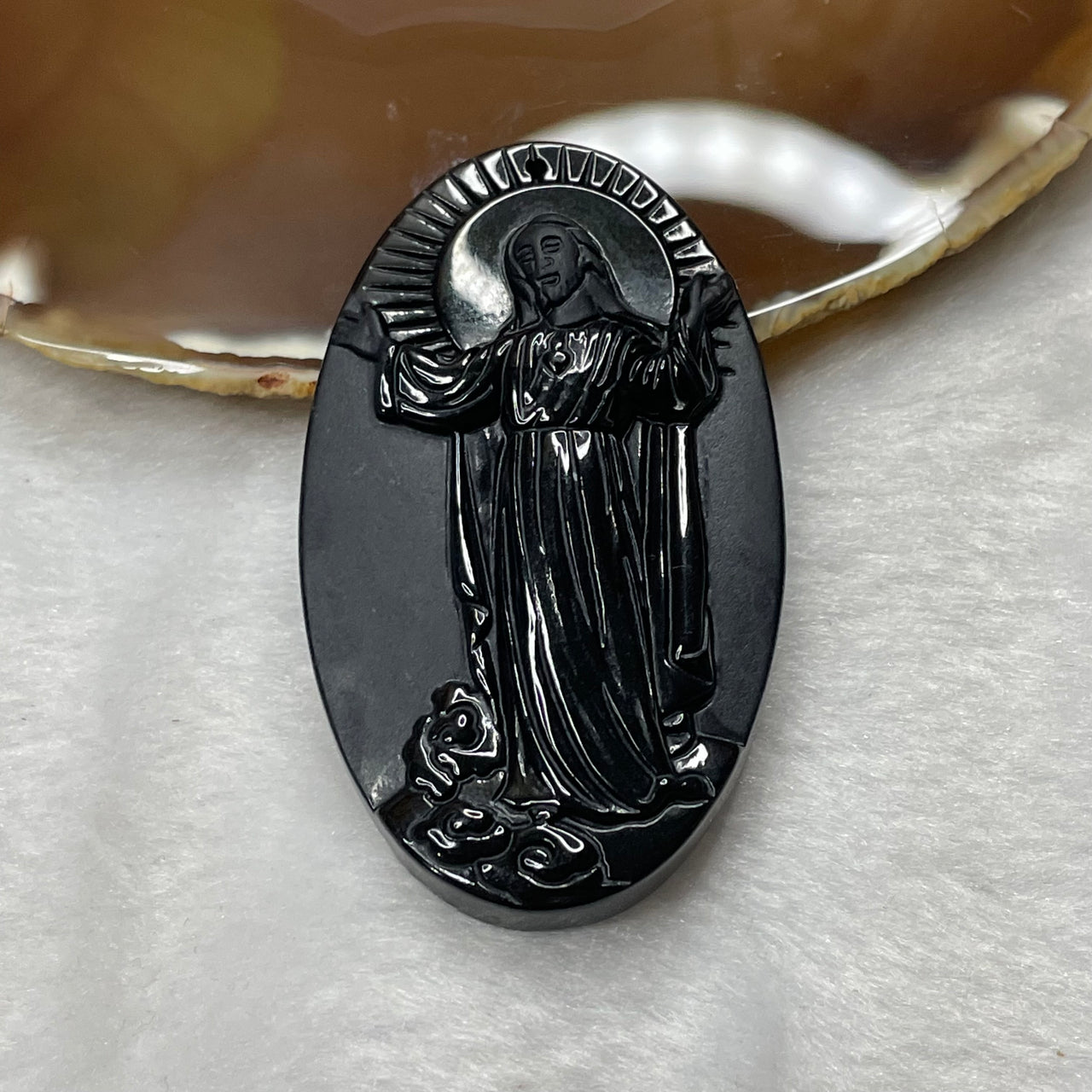 Type A Black Jade Jadeite Jesus 38.56g 68.3 by 39.0 by 7.4mm - Huangs Jadeite and Jewelry Pte Ltd