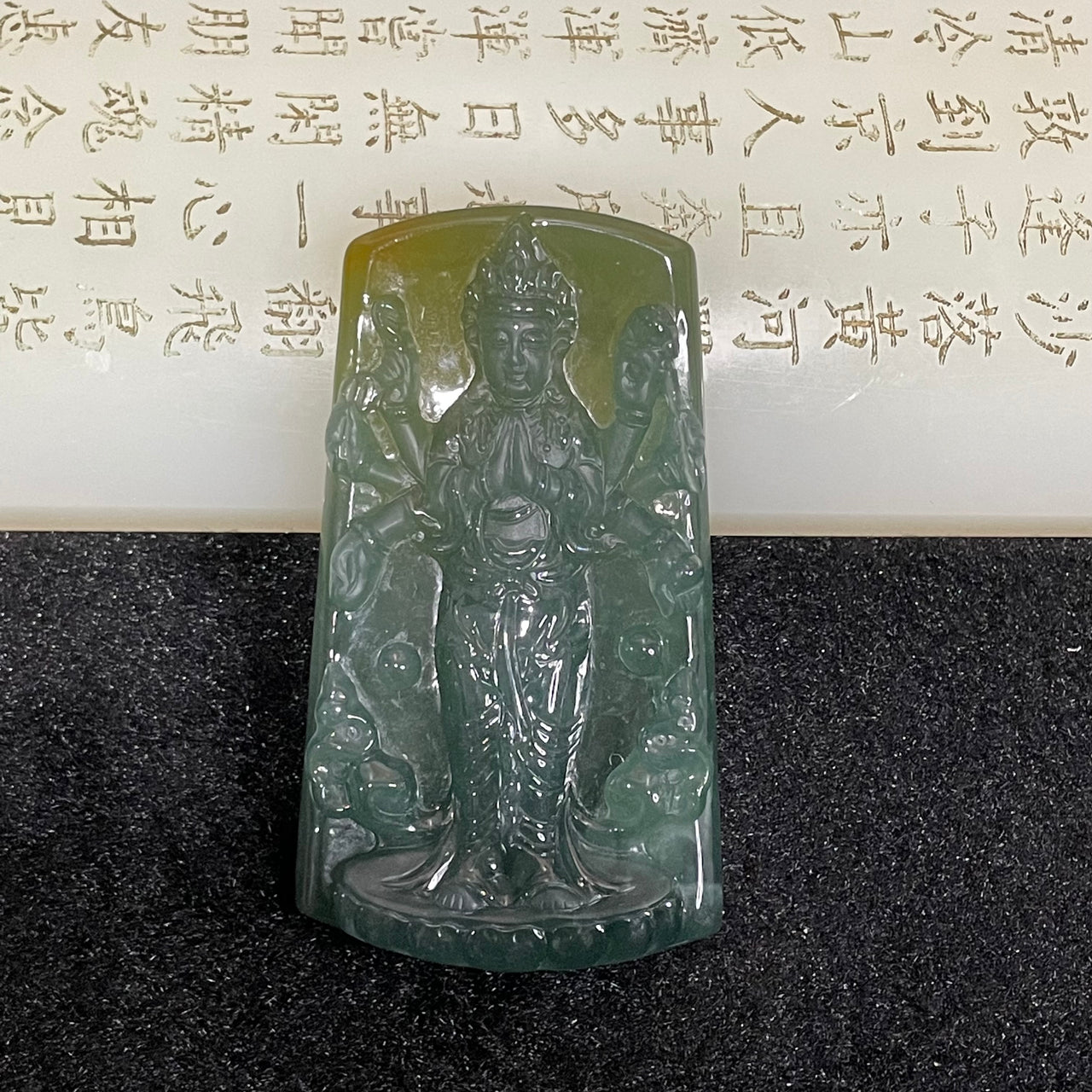 Type A Icy Yellow Blueish Green Thousand hands Guan Yin Jade Jadeite 38.55g 66.0 by 37.1 by 8.6mm - Huangs Jadeite and Jewelry Pte Ltd