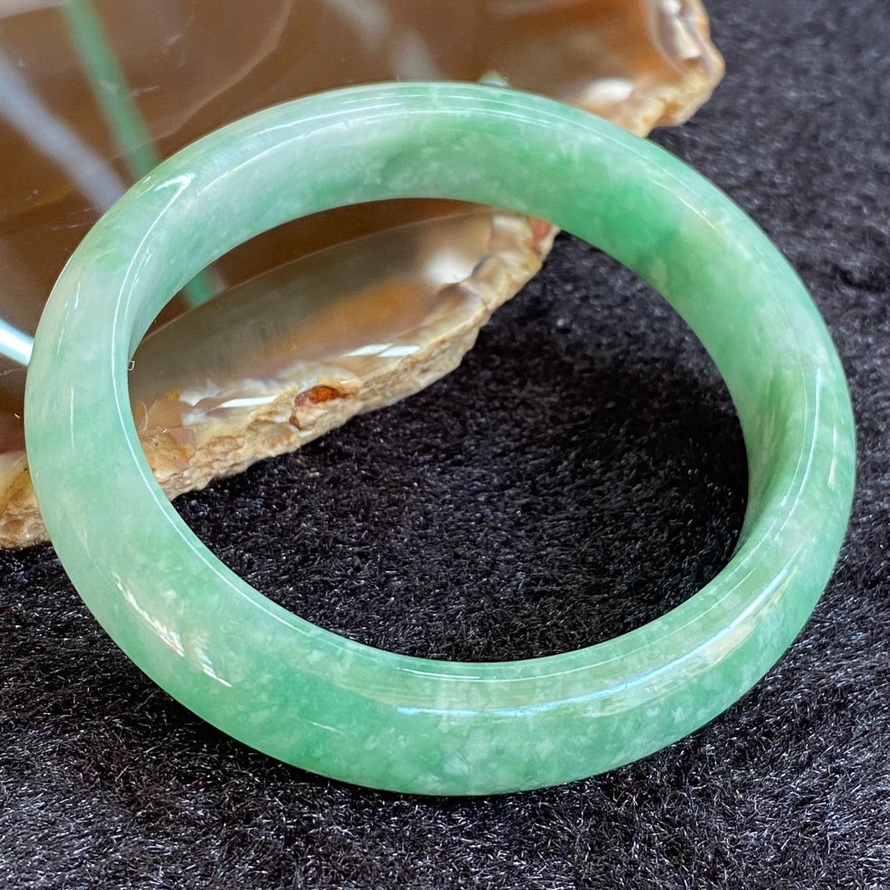 Type A Green Dou Qing Oval Bangle - 39.06g inner diameter 53.6mm Thickness 11.6 by 7.2mm - Huangs Jadeite and Jewelry Pte Ltd