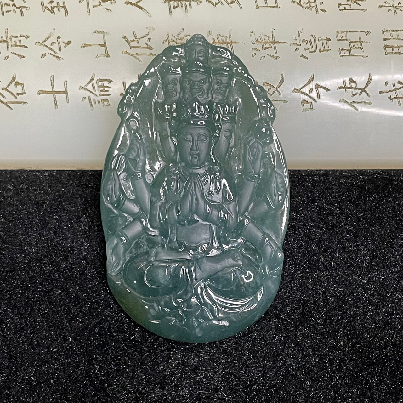 Type A Blueish Green Jade Jadeite thousand hands Guan Yin 30.29g 58.5 by 36.0 by 7.3mm - Huangs Jadeite and Jewelry Pte Ltd