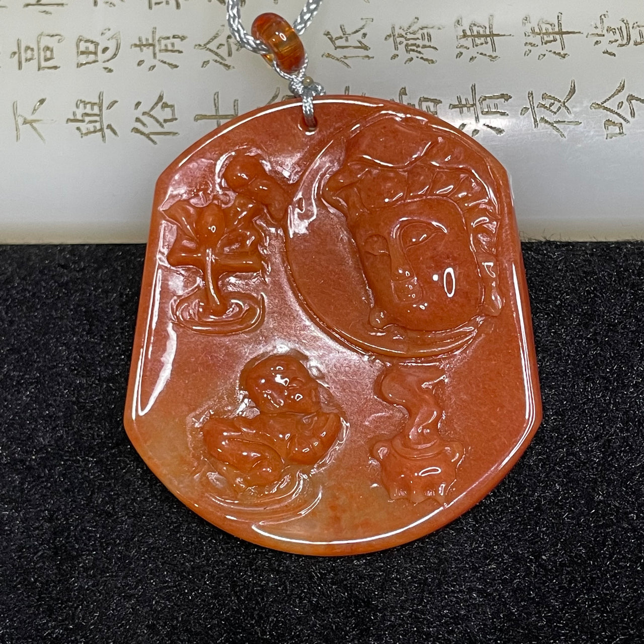 Type A Red Jade Jadeite 送子观音 Guan Yin 34.51g 55.7 by 49.5 by 6.5mm - Huangs Jadeite and Jewelry Pte Ltd