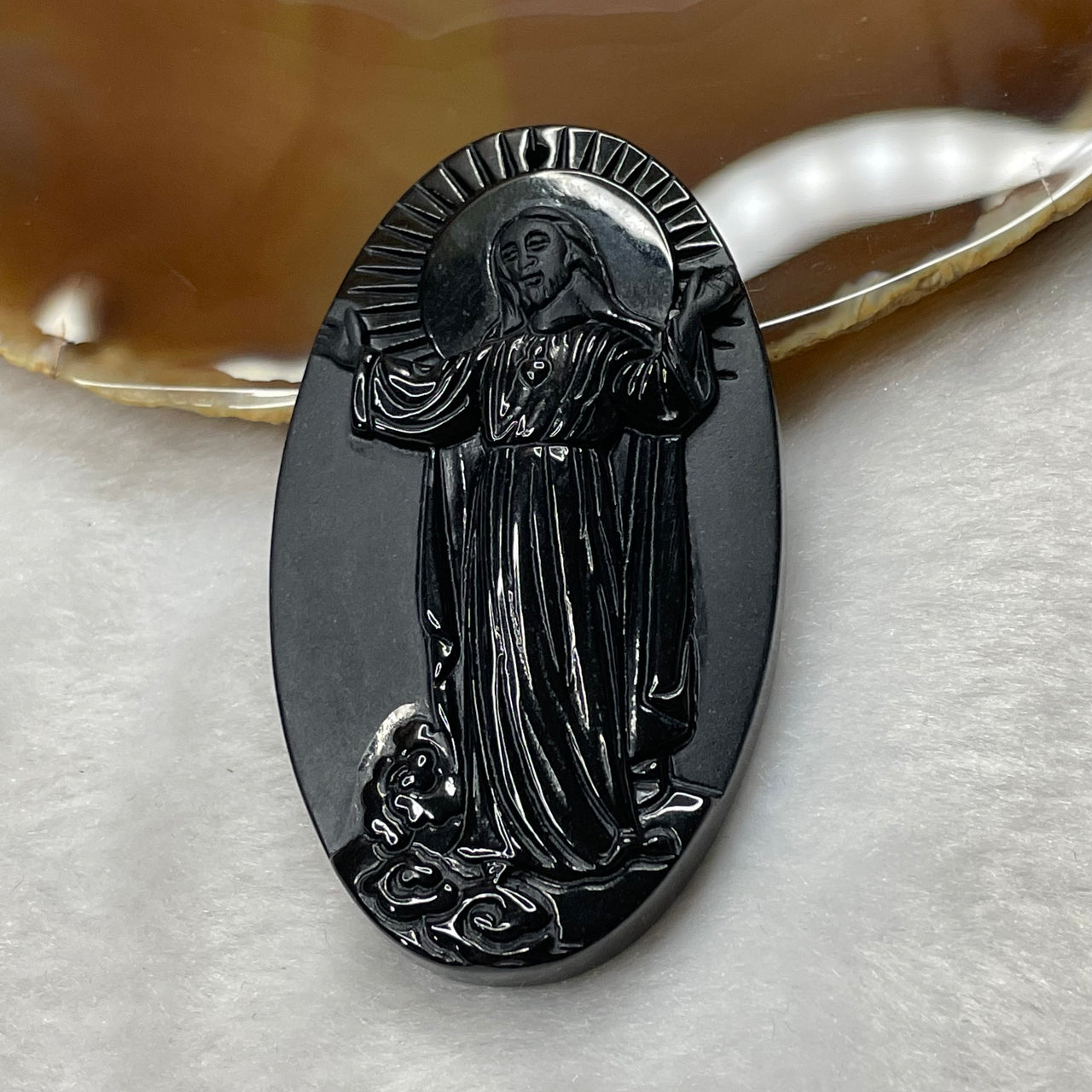 Type A Black Jade Jadeite Jesus 41.42g 67.8 by 39.2 by 7.7mm - Huangs Jadeite and Jewelry Pte Ltd